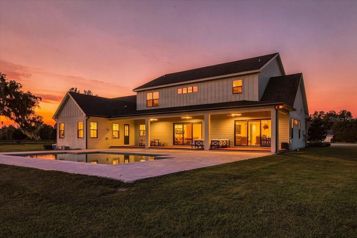 Rear View Twilight - 888 TWIN OAKS LN, WINTER HAVEN