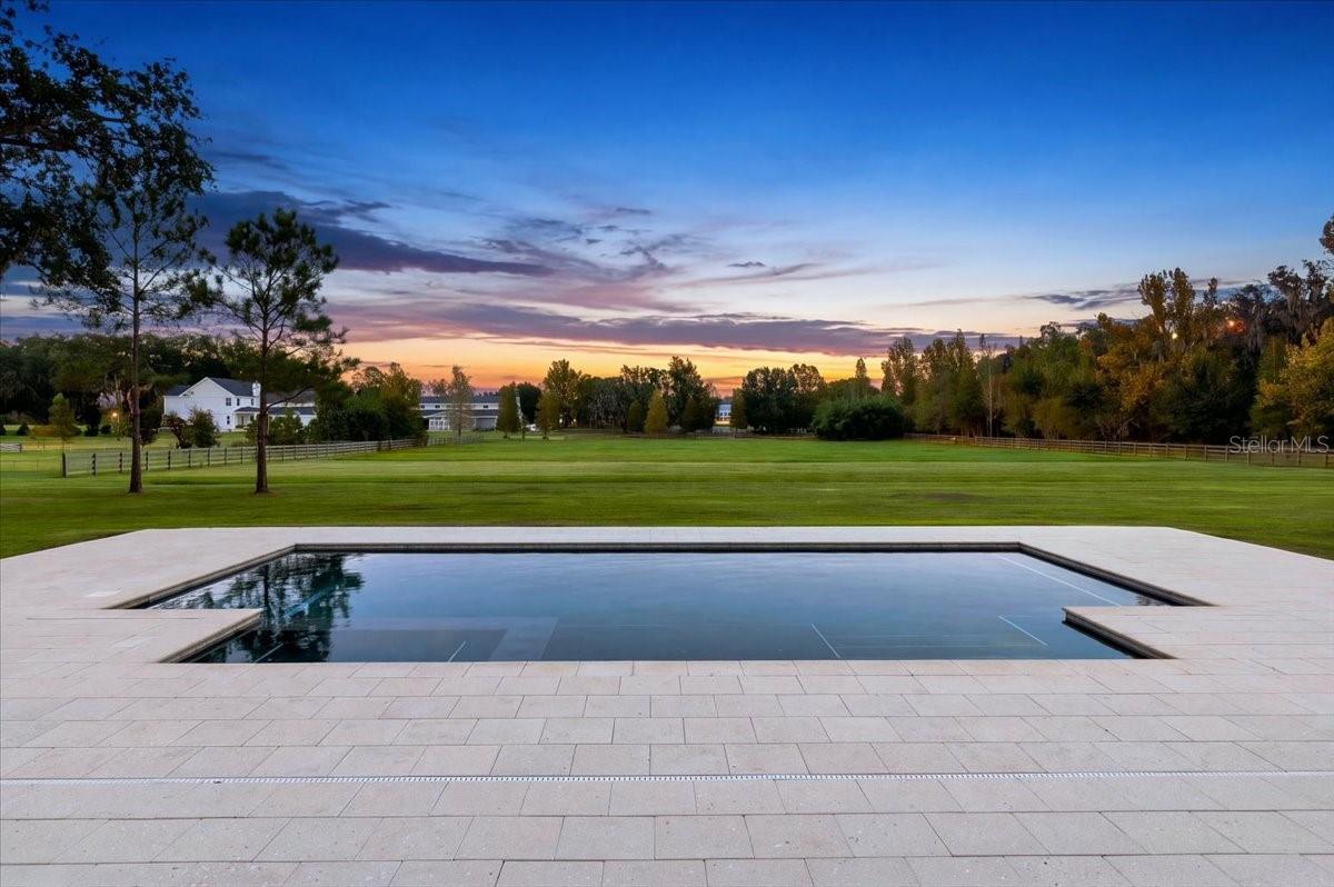 Pool Patio Looking to Rear Property - 888 TWIN OAKS LN, WINTER HAVEN