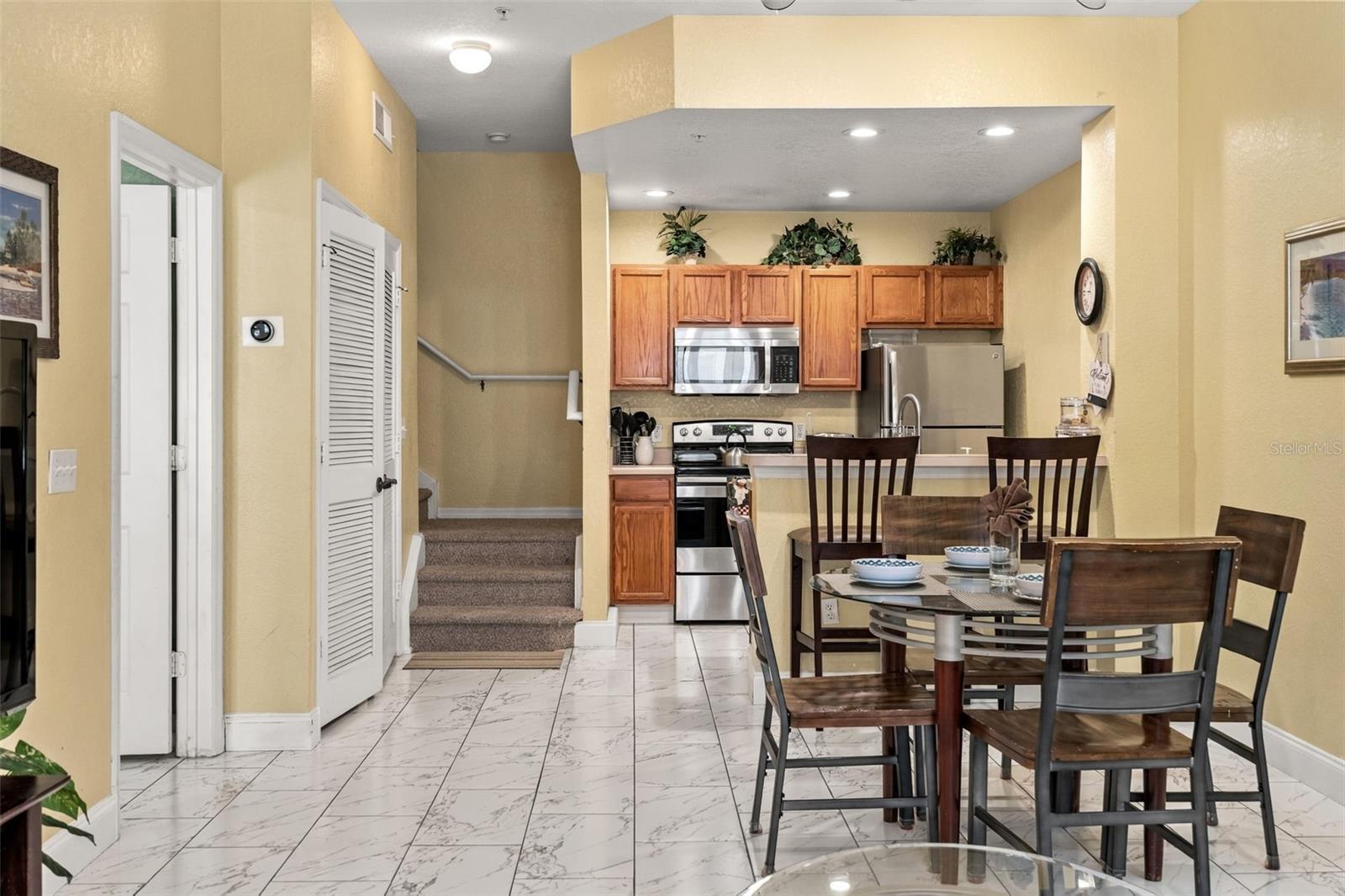 Dinning Area / Kitchen - 4600 YELLOWGOLD RD W #105, KISSIMMEE