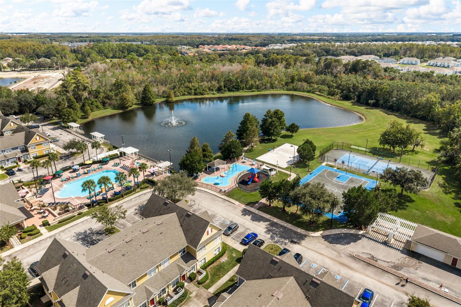 Community amenities just a 2 minute walk from the unit. - 4600 YELLOWGOLD RD W #105, KISSIMMEE