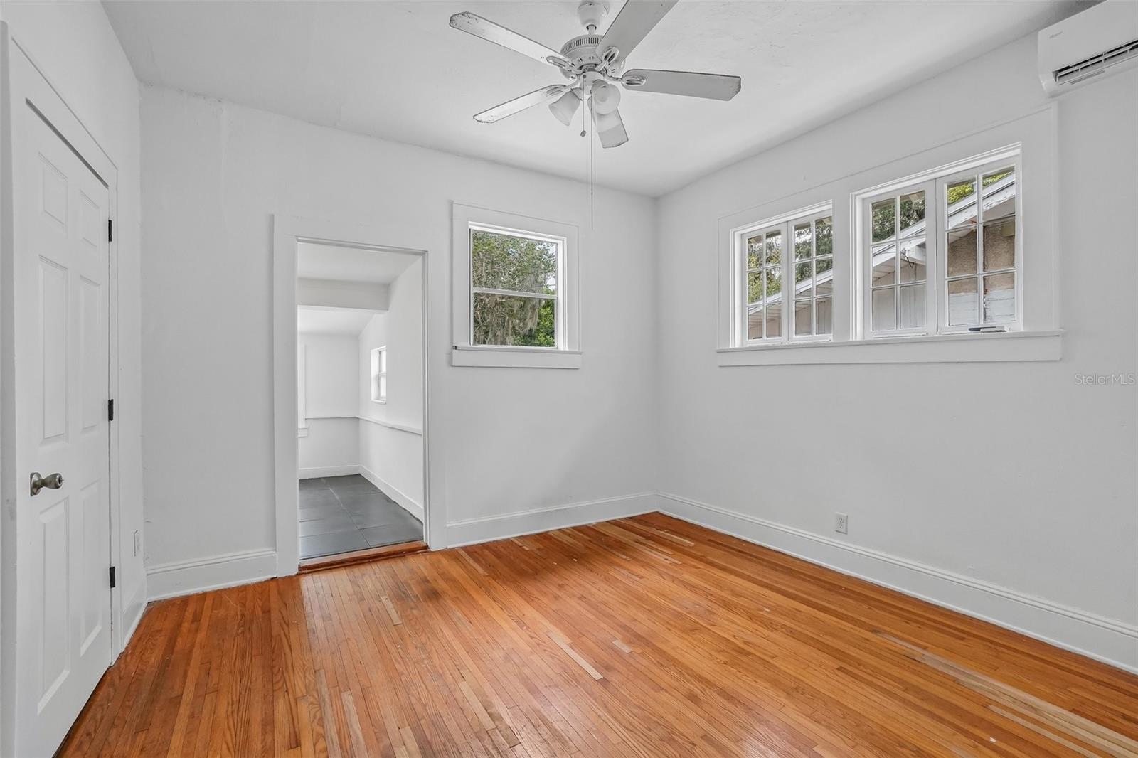 Primary Bedroom - View to Primary Bathroom - 1533 E ELM RD, LAKELAND