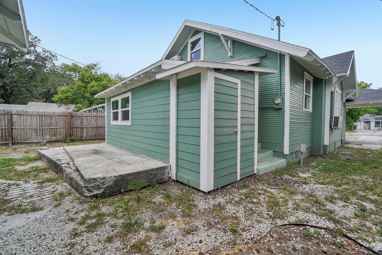 Main House Exterior - Angled Rear Porch - 1533 E ELM RD, LAKELAND