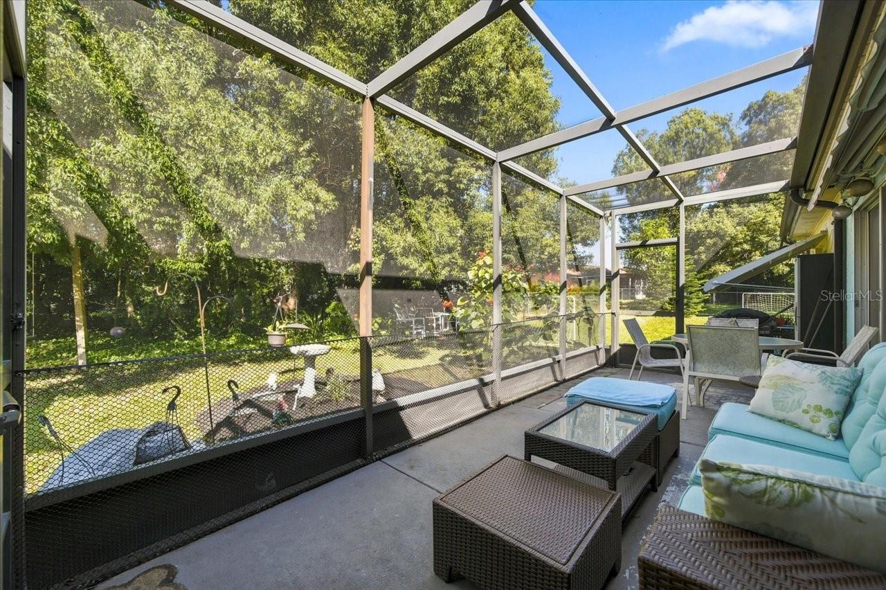 Screen in Patio with an Retractable Awning - 8109 RUMFORD CT, HUDSON