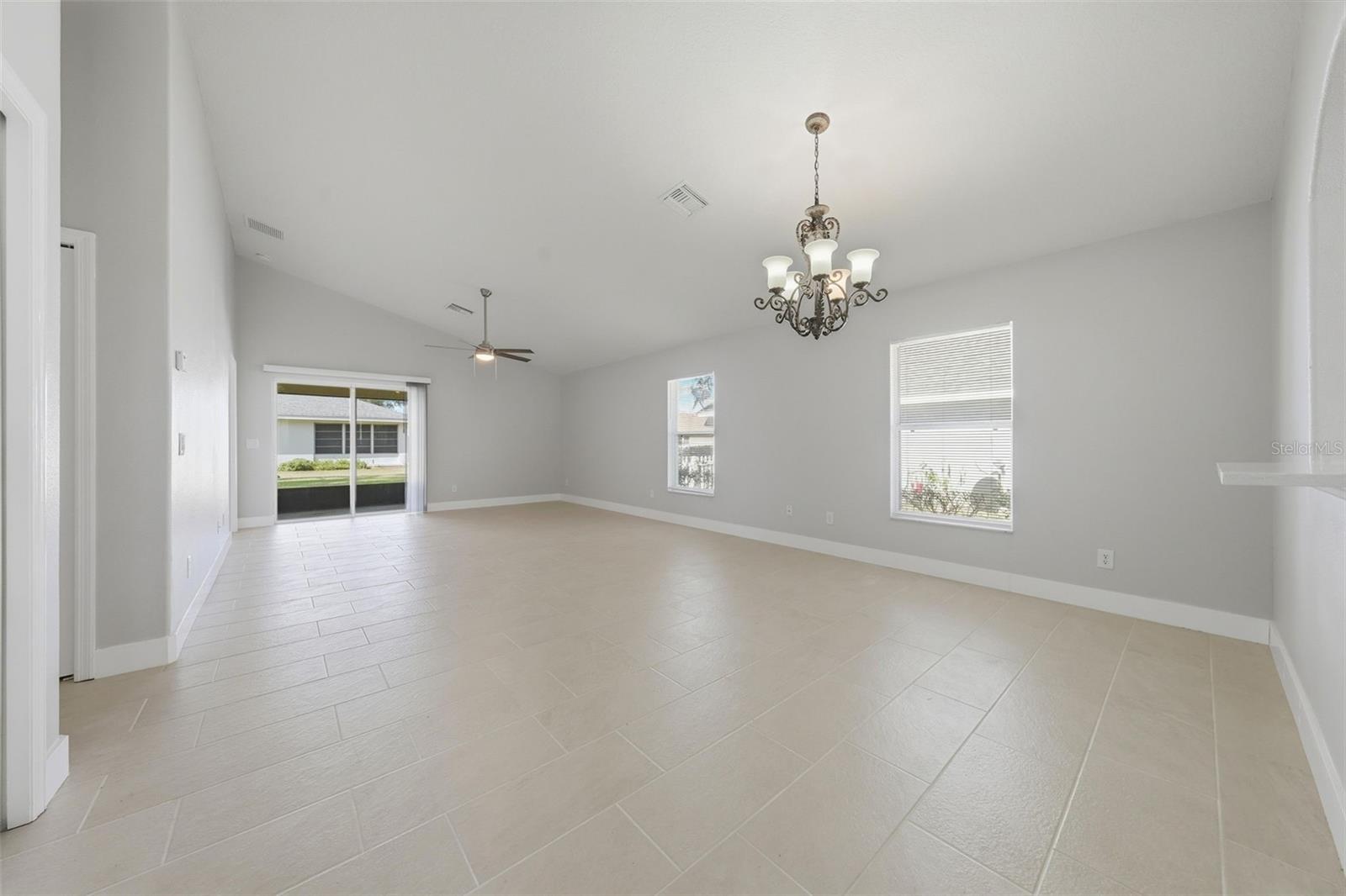 High ceilings with the Living Room and Dining room combination - 941 VINDALE RD, TAVARES
