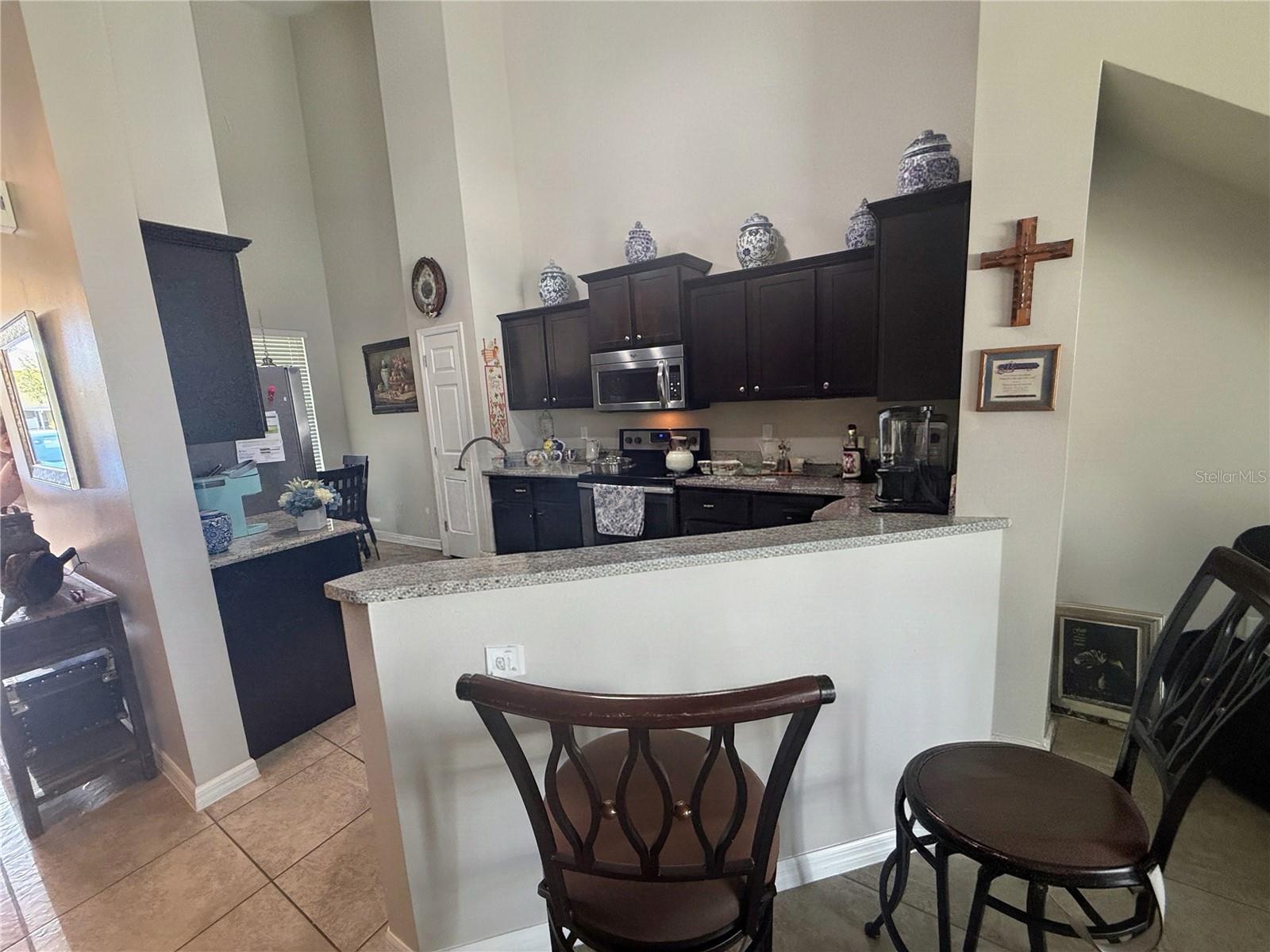 Kitchen and Breakfast Bar - 4854 POOLSIDE DR, ST CLOUD