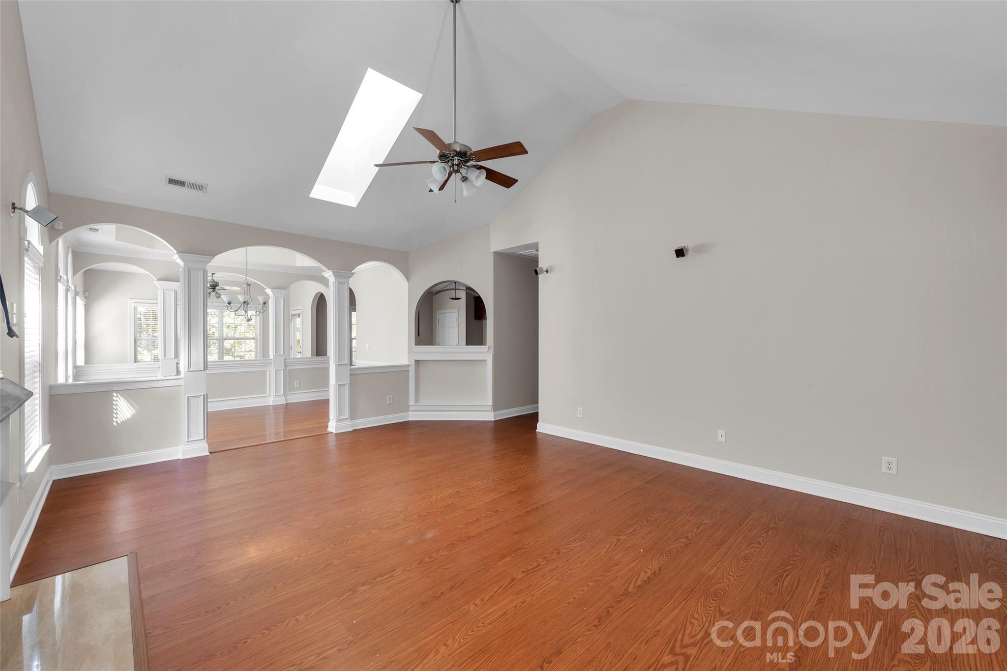 Great Room with vaulted ceiling and view to backyard - 1240 Saint Johns Avenue, Matthews