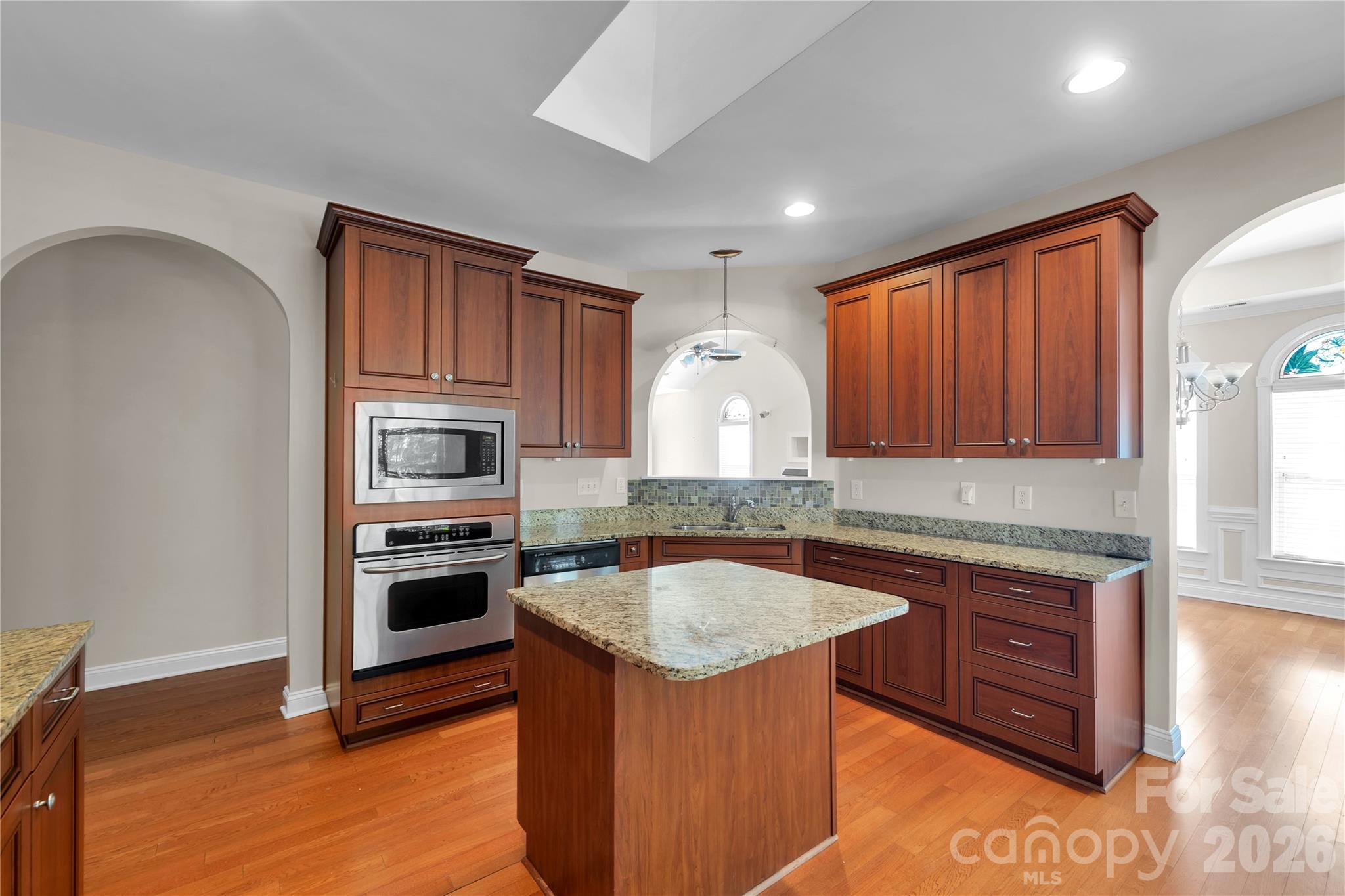 Kitchen with opening to Great Room.  Breakfast Bar on Island - 1240 Saint Johns Avenue, Matthews