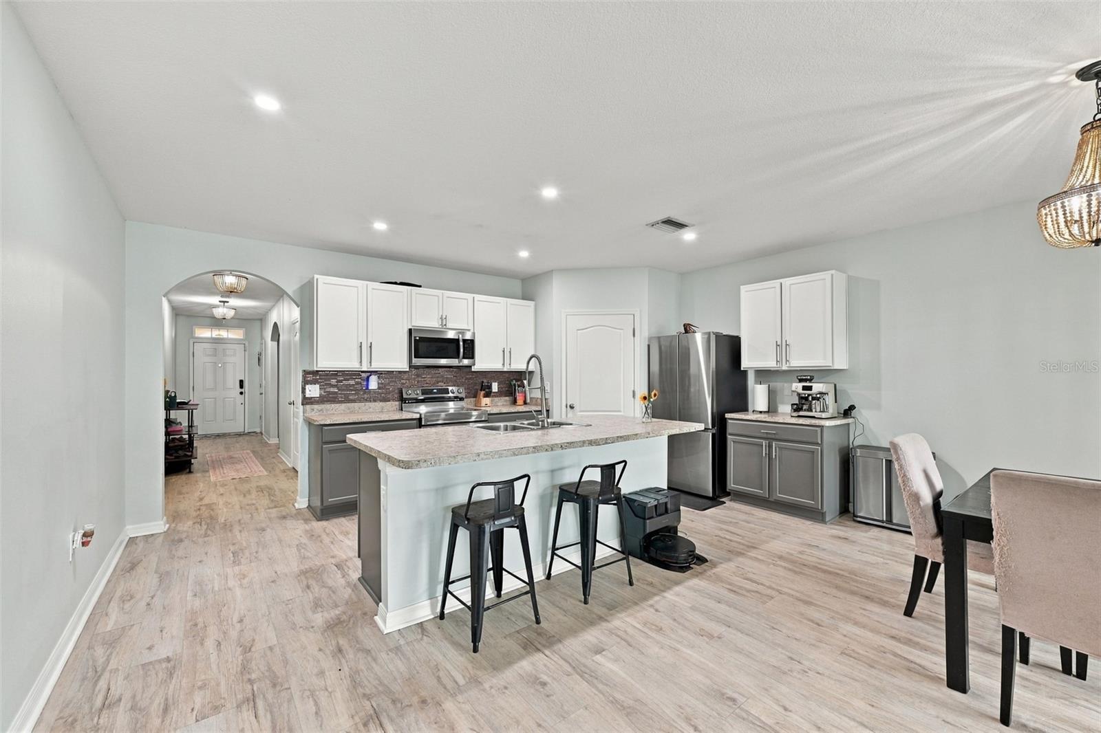Kitchen with breakfast bar - 5213 11TH ST E, BRADENTON