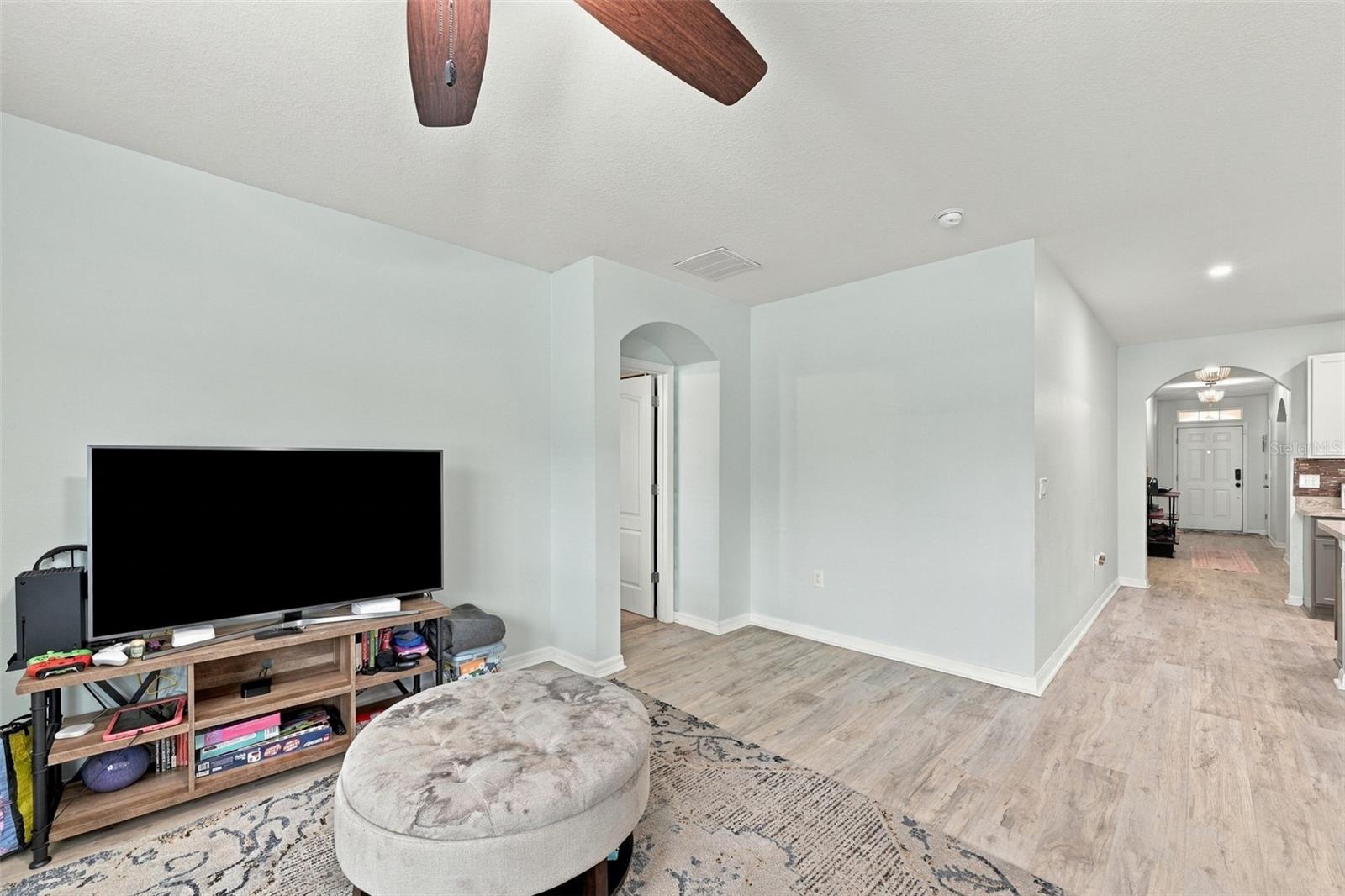 Living room/hallway to 3 guest bedrooms and laundry - 5213 11TH ST E, BRADENTON