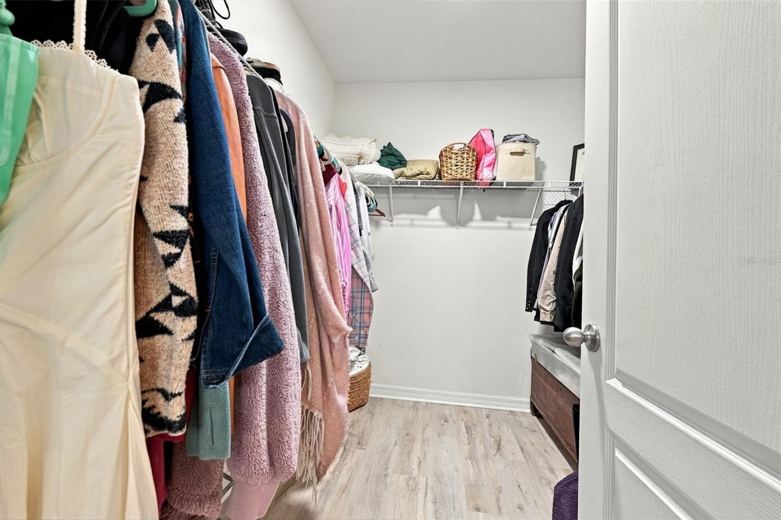 One of two primary bedroom closets - 5213 11TH ST E, BRADENTON