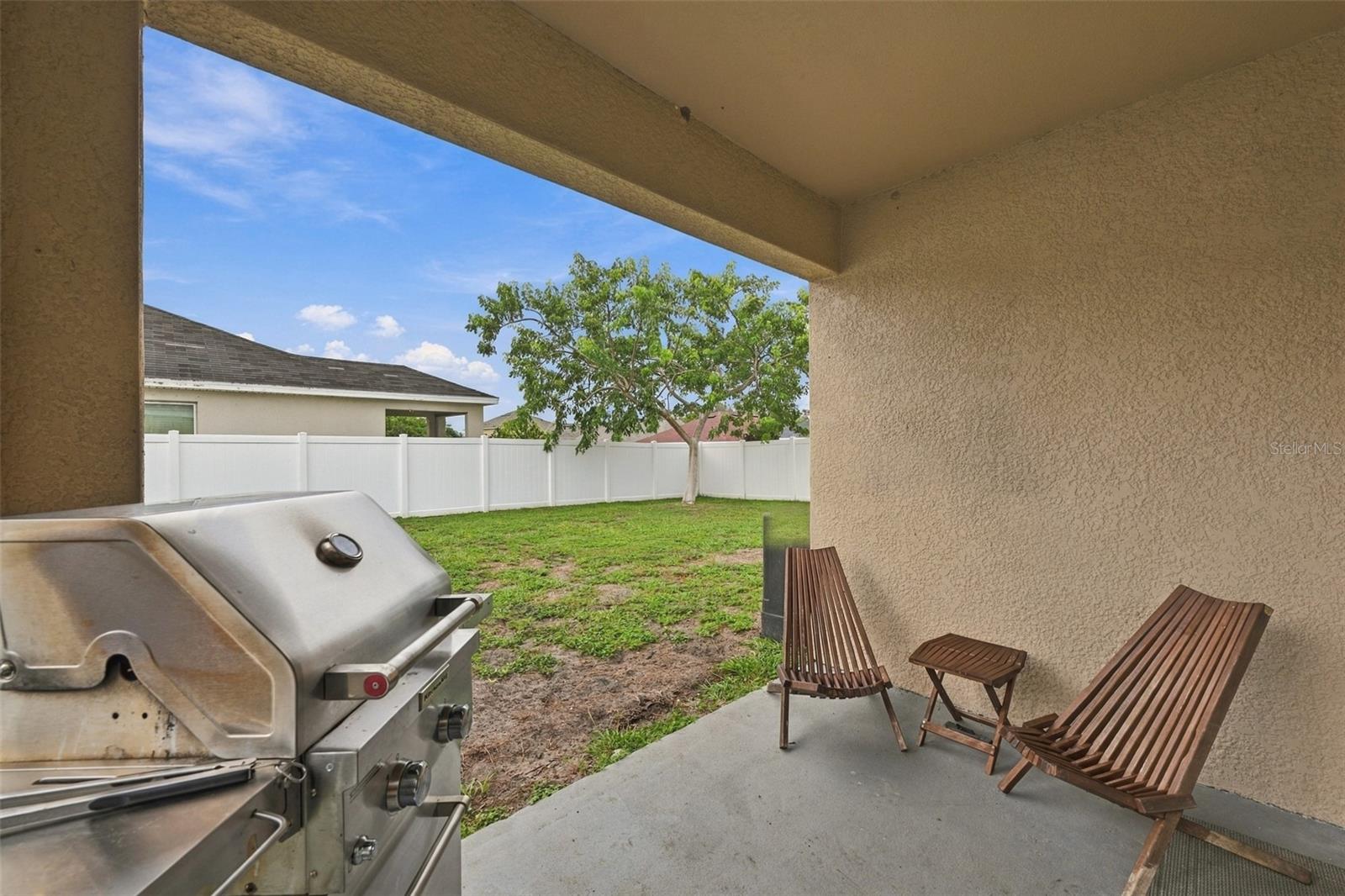 Covered lanai area with access from dining area sliding doors - 5213 11TH ST E, BRADENTON