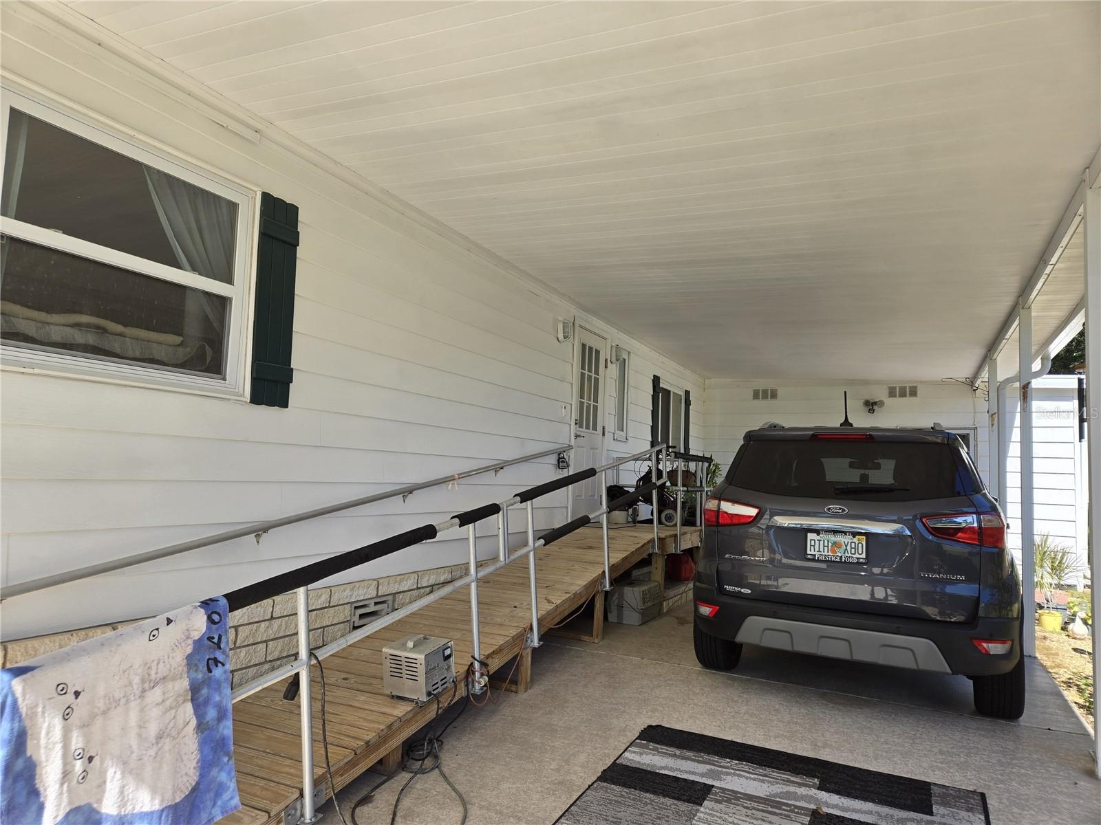 entry ramp carport - 3889 DIAMOND OAK WAY #493, ZELLWOOD