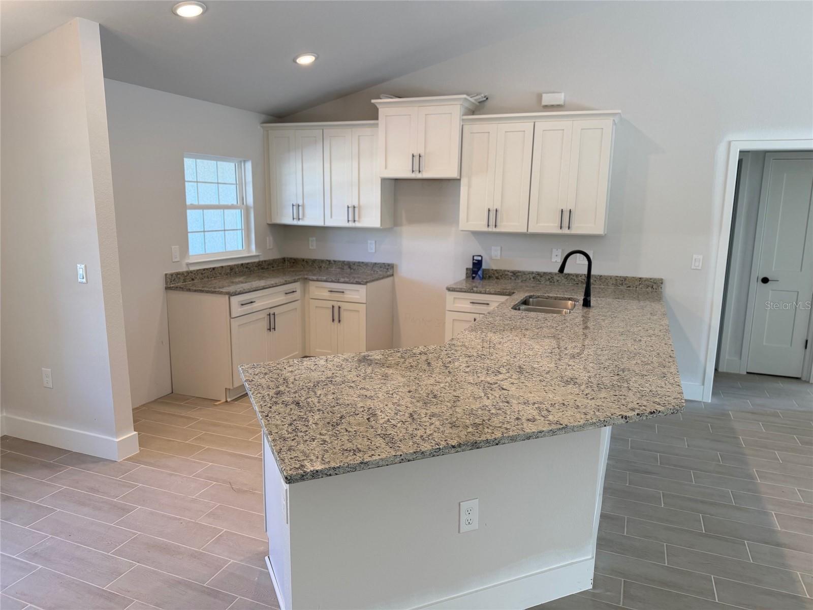 Single Family Residence at 132 CAMILLIA LN, PORT CHARLOTTE, photo 2 of 6