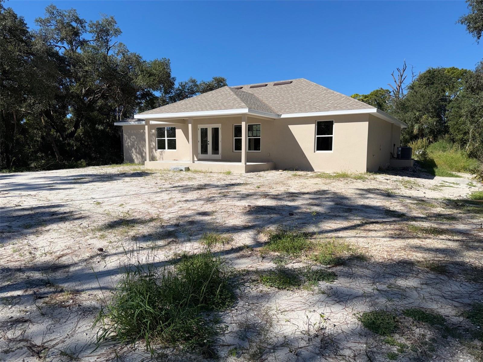 Single Family Residence at 132 CAMILLIA LN, PORT CHARLOTTE, photo 4 of 6