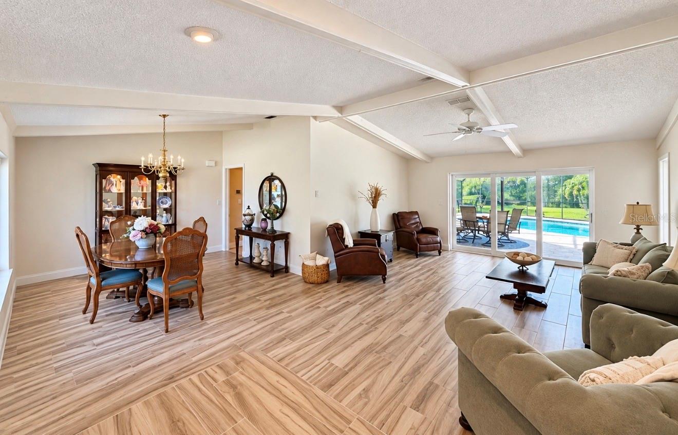 Front living room with cathedral ceilings - 9690 LEEWARD AVE, LARGO