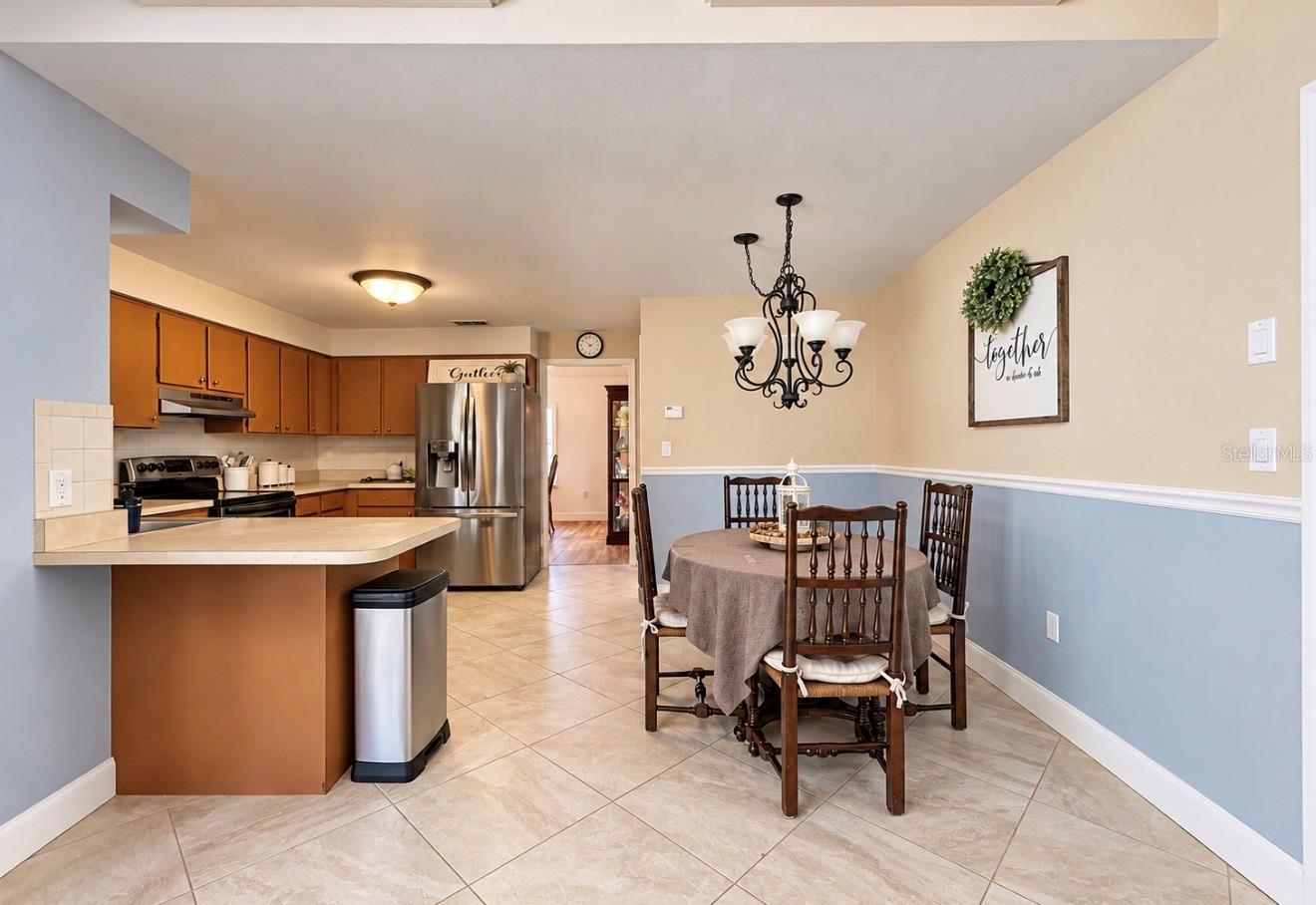 Dinette and kitchen - 9690 LEEWARD AVE, LARGO