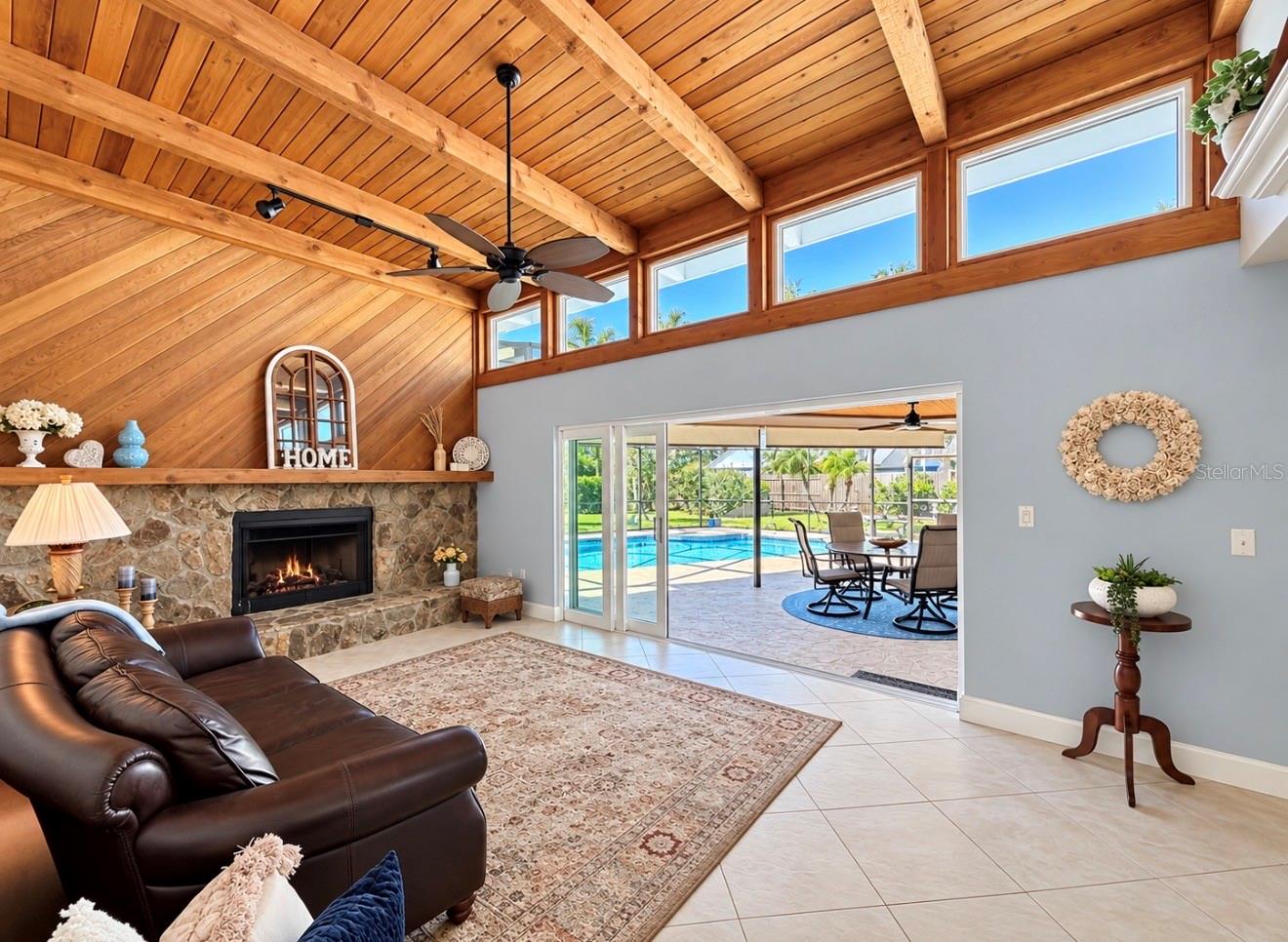Family room with natural light and fireplace - 9690 LEEWARD AVE, LARGO