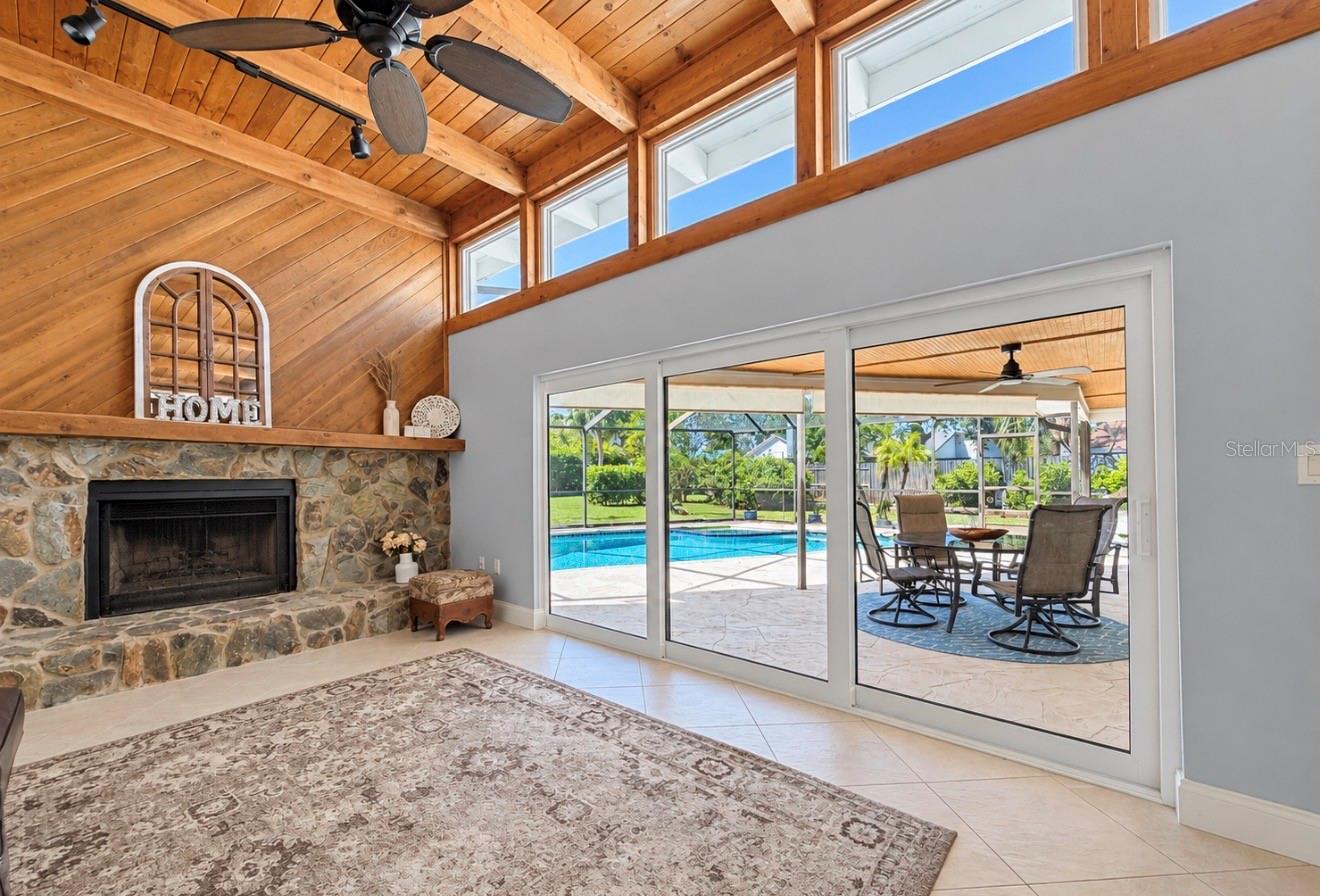 Family room with fireplace - 9690 LEEWARD AVE, LARGO