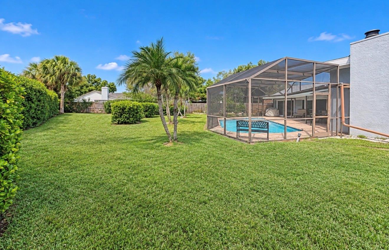 extremely large backyard - 9690 LEEWARD AVE, LARGO