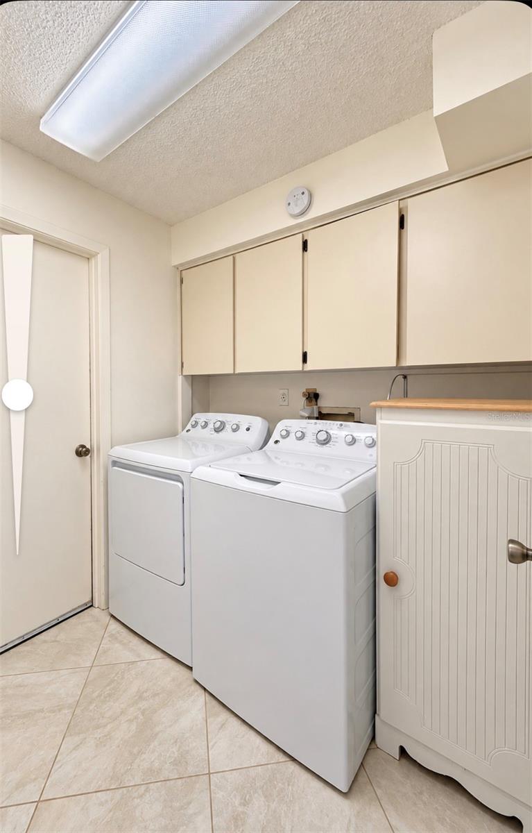 inside laundry room - 9690 LEEWARD AVE, LARGO
