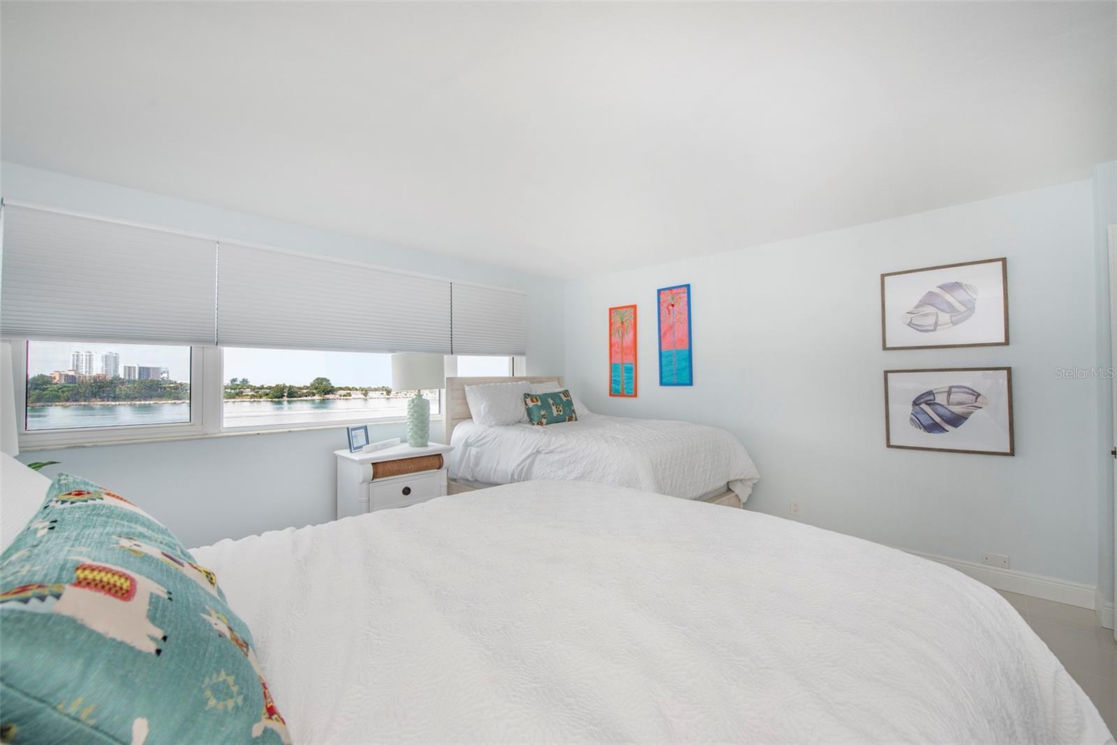 Bedroom II have two full beds and VIEWS along one whole side as well as large closet - 675 S GULFVIEW BLVD #704, CLEARWATER