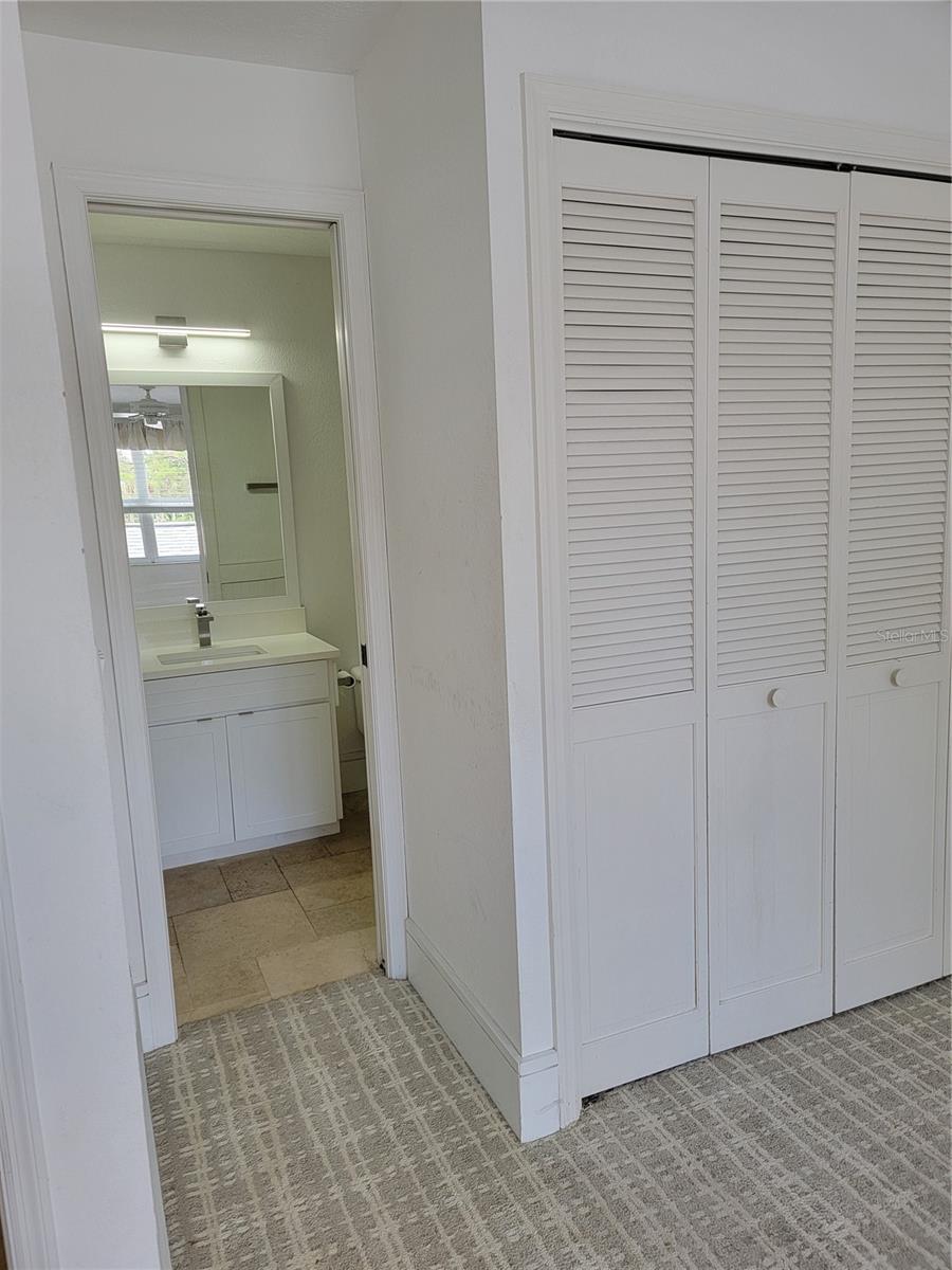 With Jack and Jill entrance to the second bathroom - 5654 SHEFFIELD GREENE CIR #28, SARASOTA
