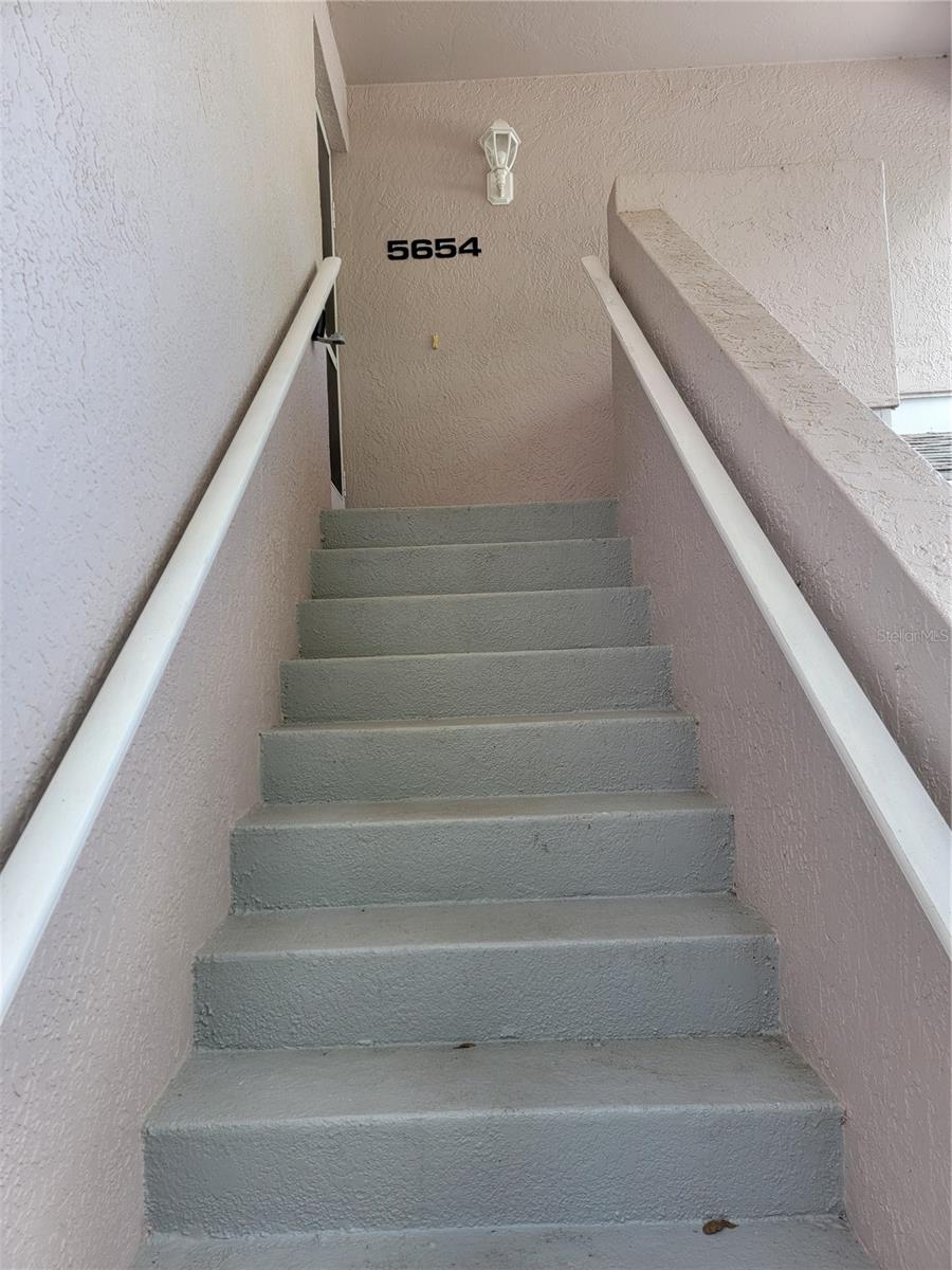 Stairway to 2nd floor - 5654 SHEFFIELD GREENE CIR #28, SARASOTA
