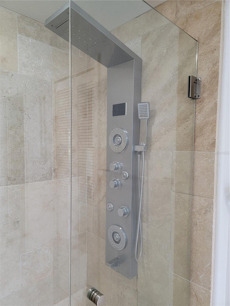Shower in en-suite bathroom - 5654 SHEFFIELD GREENE CIR #28, SARASOTA