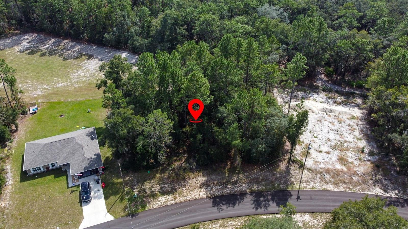 Aerial view for SEC 12 TWP 17 RGE 20 PLAT BOOK O PAGE 225 MARION OAKS UNIT 12 BLK 1426 LOT 7 - Lot 7 SW 89TH CIR, OCALA
