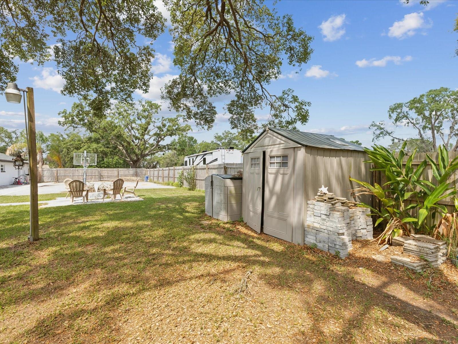 Backyard Storage and Fire Pit Seating Area - 1222 HUNTINGTON AVE, SPRING HILL