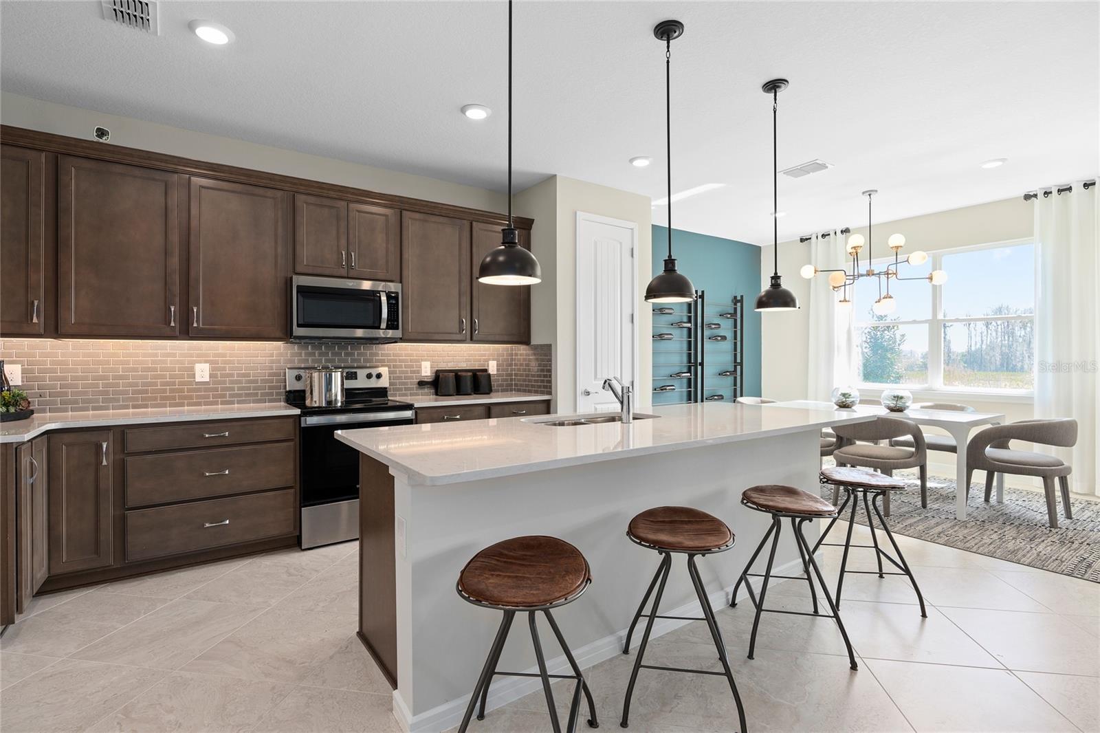 Model Home Design Only. Pictures and furnishings are for illustrative purposes only. Elevations, colors and options may vary. Furniture is for model home staging only. - 2502 SERENITY GARDEN DR, KISSIMMEE