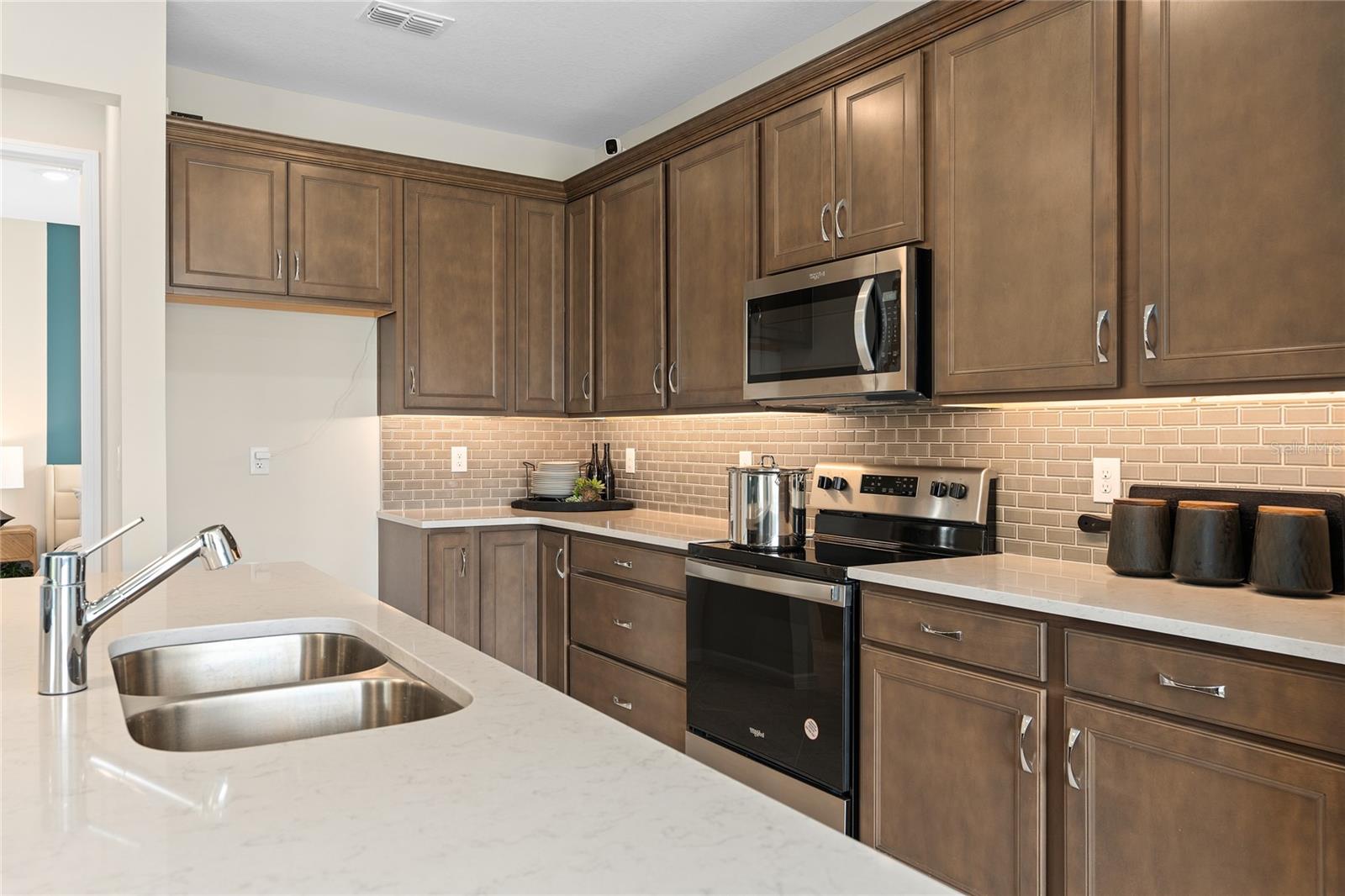 Model Home Design Only. Pictures and furnishings are for illustrative purposes only. Elevations, colors and options may vary. Furniture is for model home staging only. - 2502 SERENITY GARDEN DR, KISSIMMEE