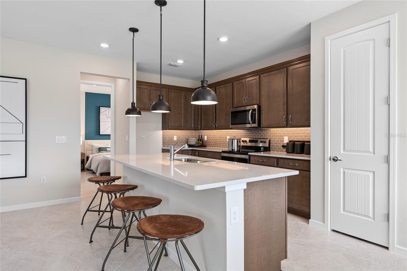 Model Home Design Only. Pictures and furnishings are for illustrative purposes only. Elevations, colors and options may vary. Furniture is for model home staging only. - 2502 SERENITY GARDEN DR, KISSIMMEE