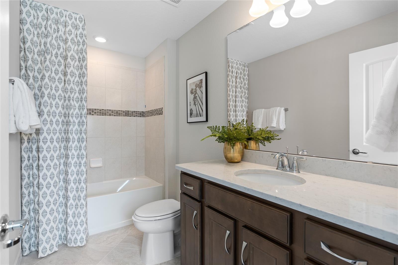 Model Home Design Only. Pictures and furnishings are for illustrative purposes only. Elevations, colors and options may vary. Furniture is for model home staging only. - 2502 SERENITY GARDEN DR, KISSIMMEE