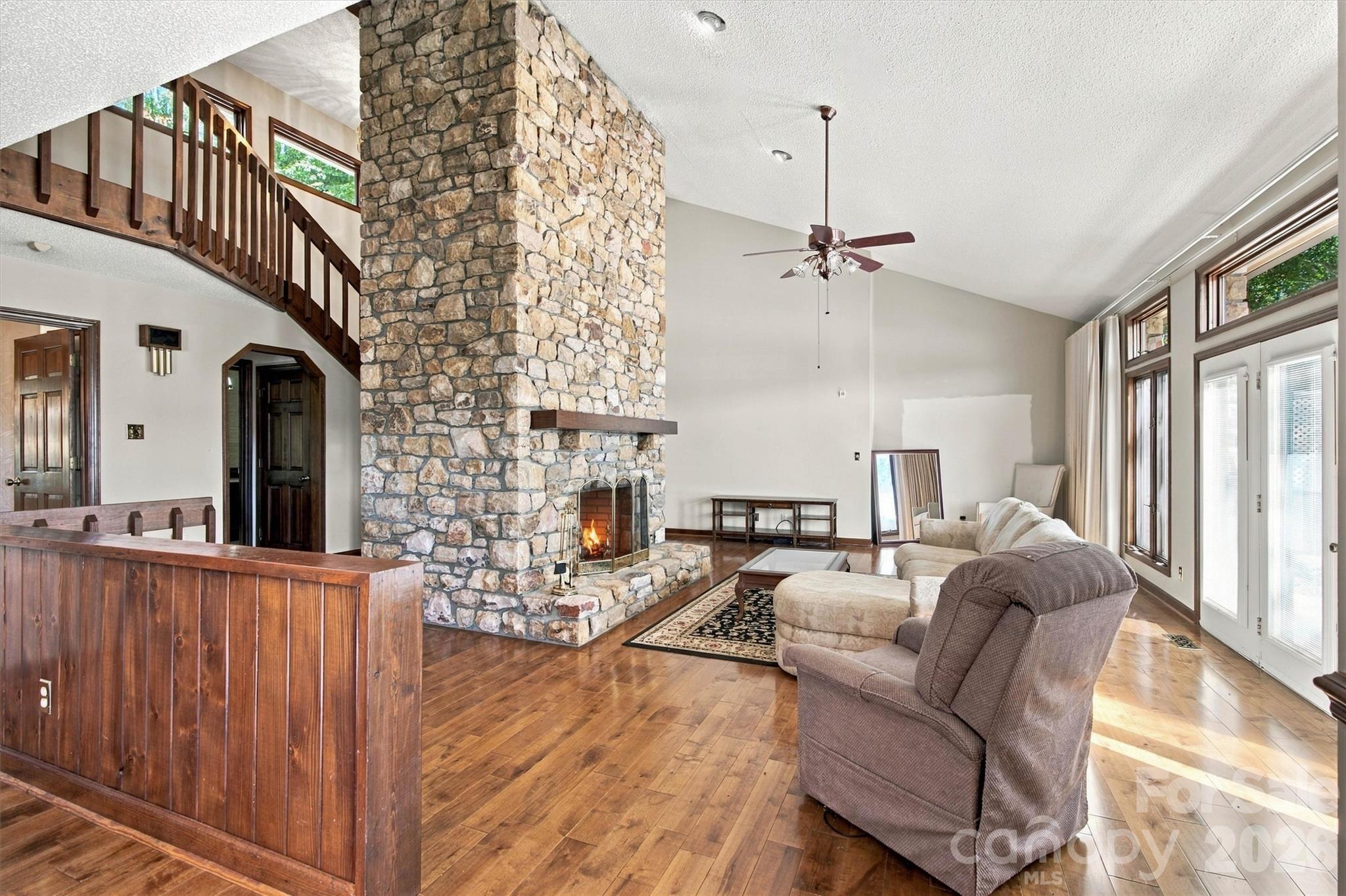 Actual Two-Story Great Room/Stone Fireplace View - 35 S Point Lane, Taylorsville