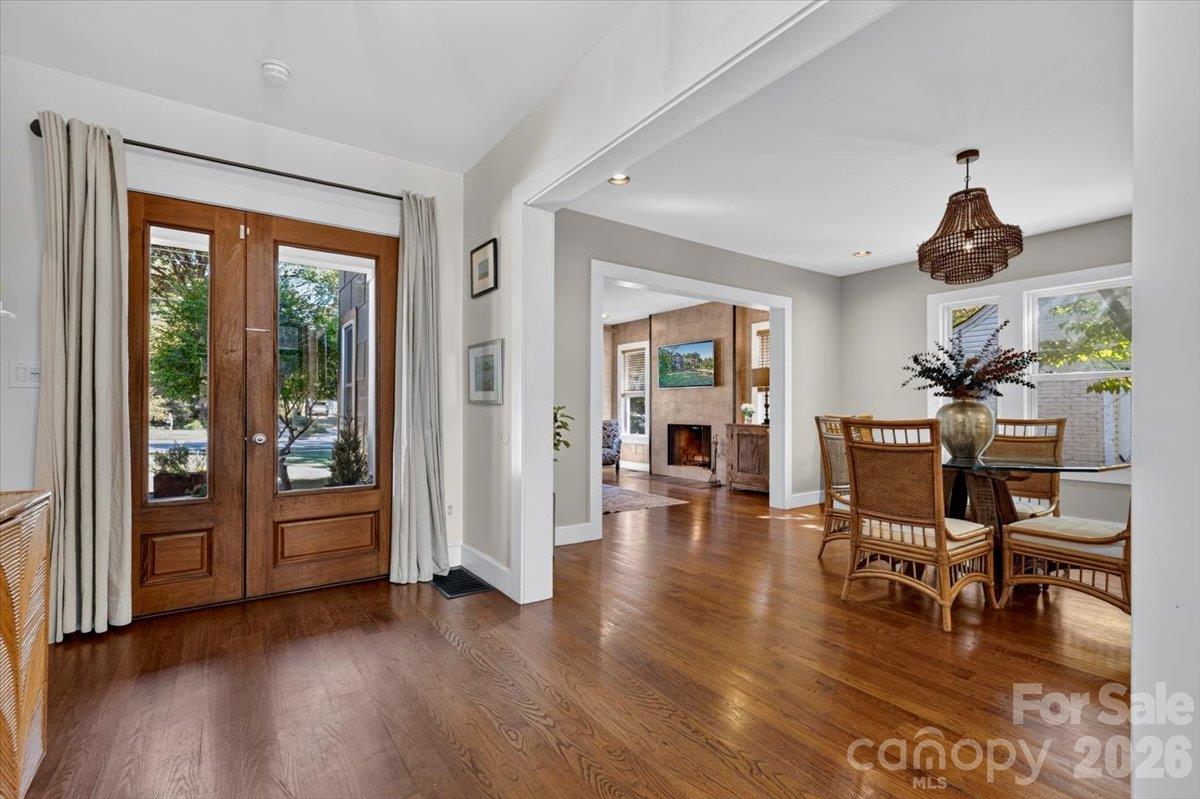 A look back shows an open-concept dining and living room area. - 521 Forest Lane, Rock Hill