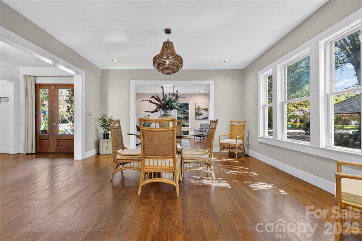 The dining room is spacious and can comfortably accommodate an 8- to 12-person table. - 521 Forest Lane, Rock Hill