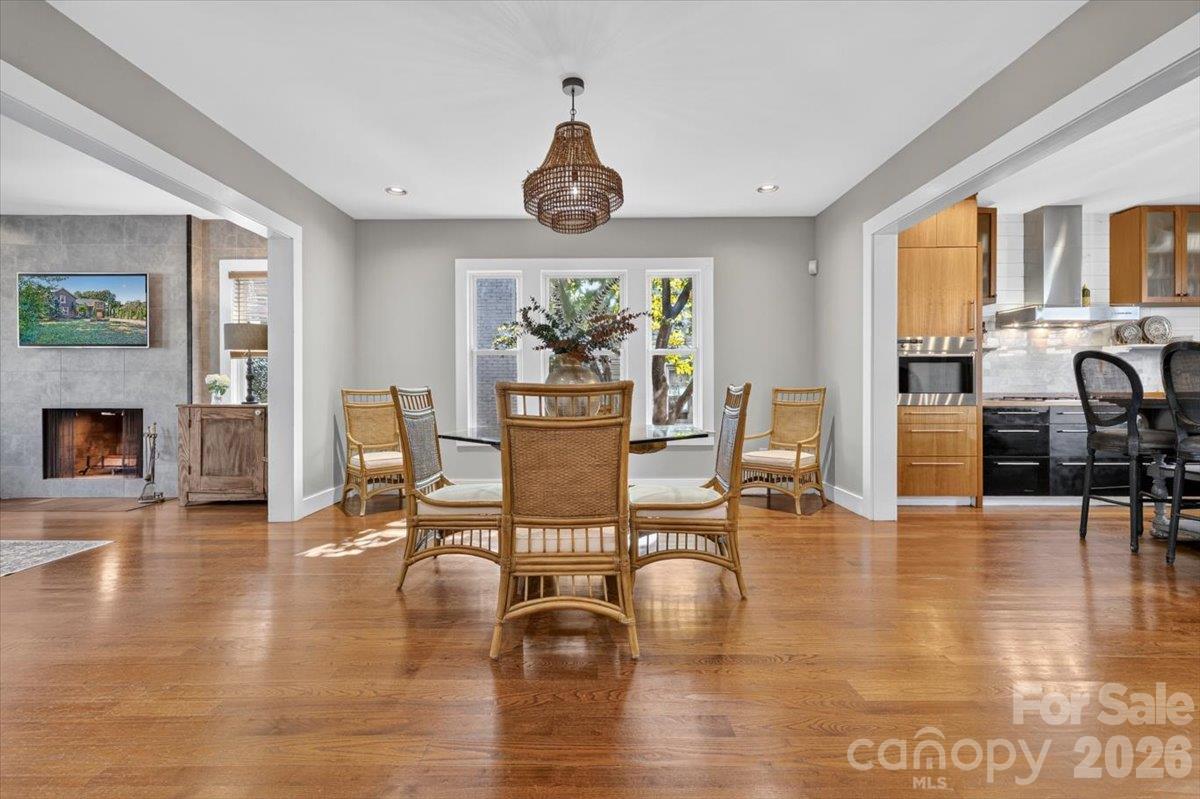 Architect Greg Tew selected for the floors, black locust wood, a material historically used in ship building for its durability. - 521 Forest Lane, Rock Hill