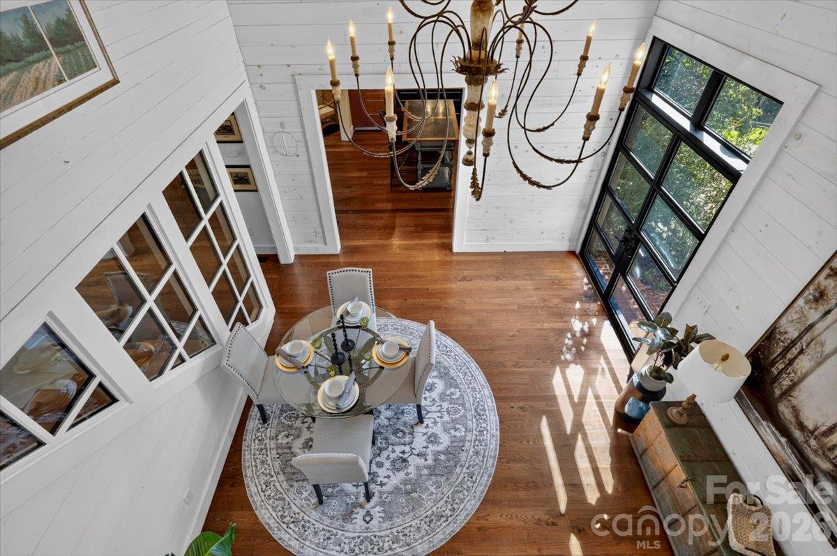 This bird's-eye view of the breakfast room and kitchen shows the former exterior wall of the home to the left. - 521 Forest Lane, Rock Hill