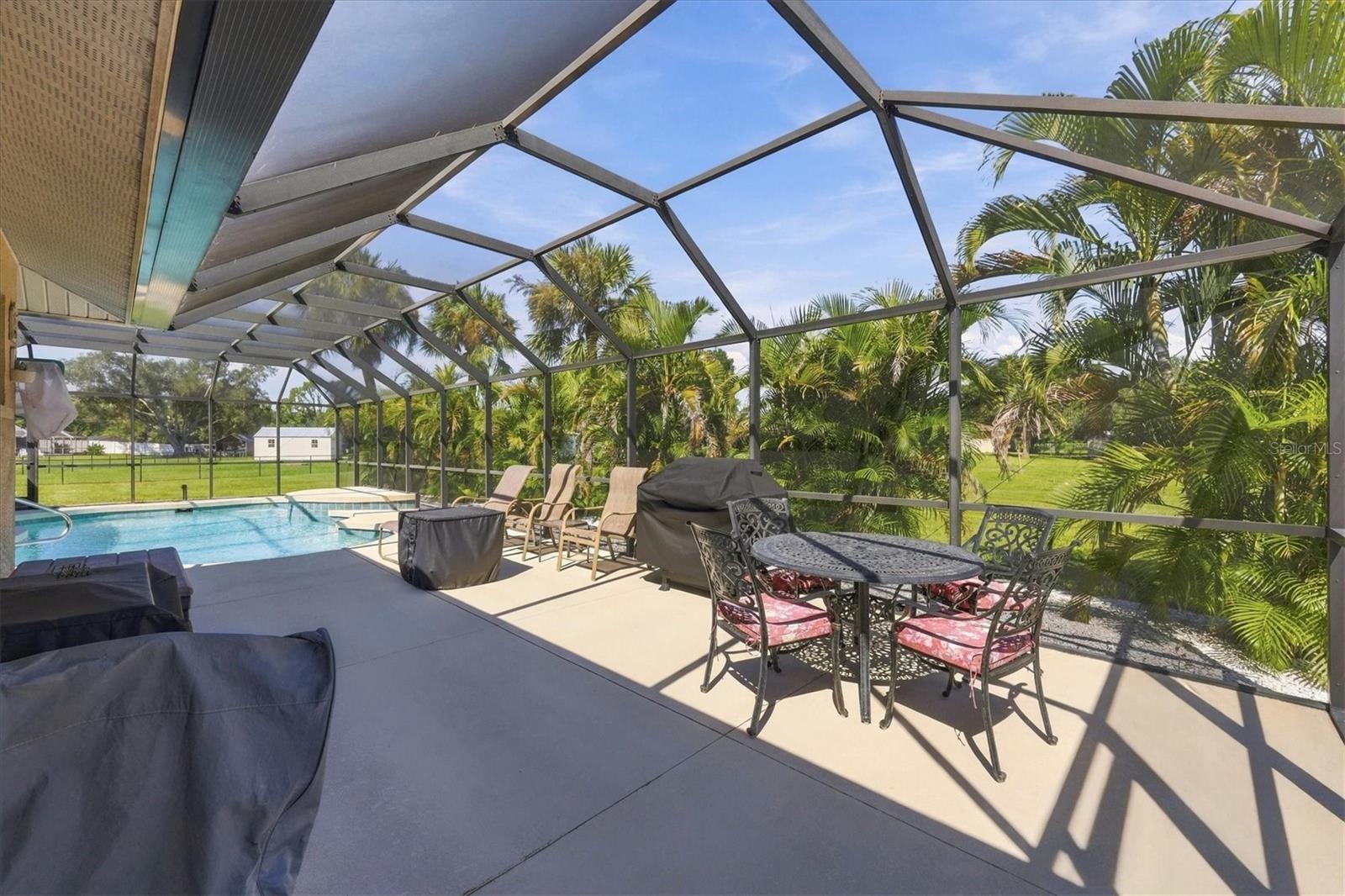 This secondary extended part of the enclosure is approximately 20x15 ft. - 2805 NORWOOD LN, VENICE
