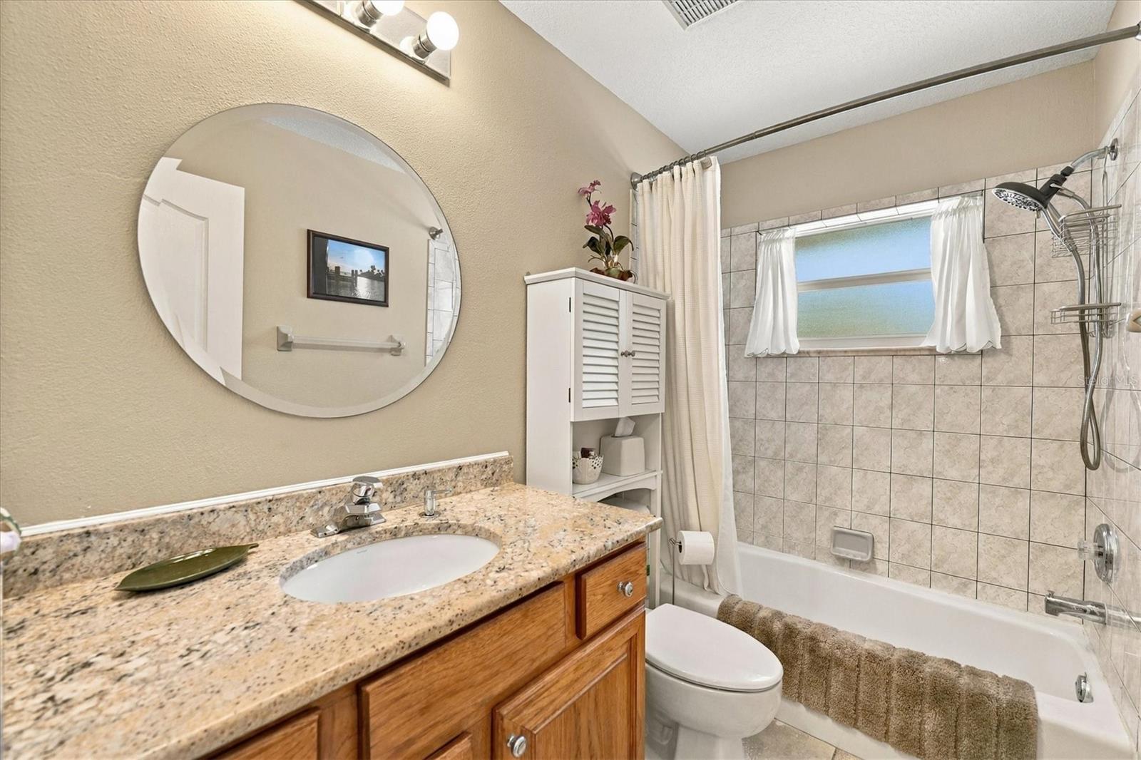 Bath 2, located by pool access. - 2805 NORWOOD LN, VENICE