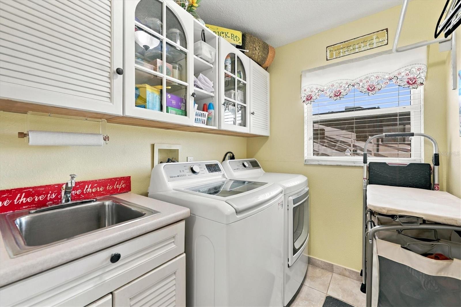 Interior laundry with storage. - 2805 NORWOOD LN, VENICE