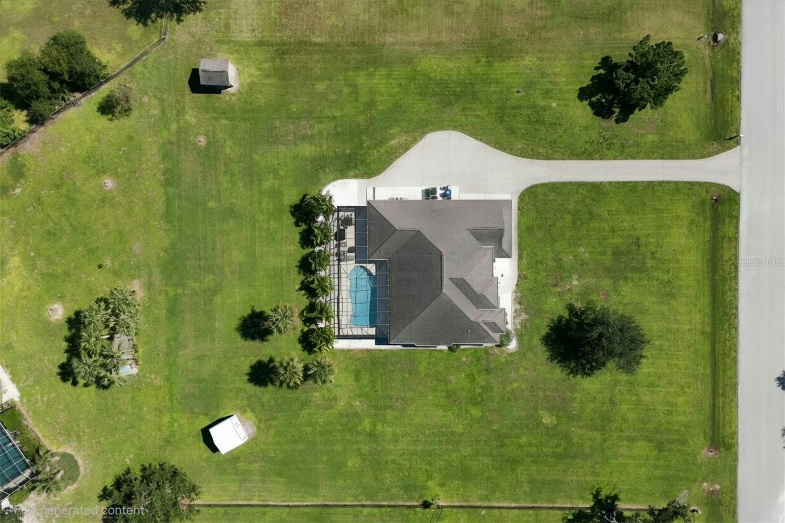 Rear lot line is about the darker green swale line behind the sheds. - 2805 NORWOOD LN, VENICE