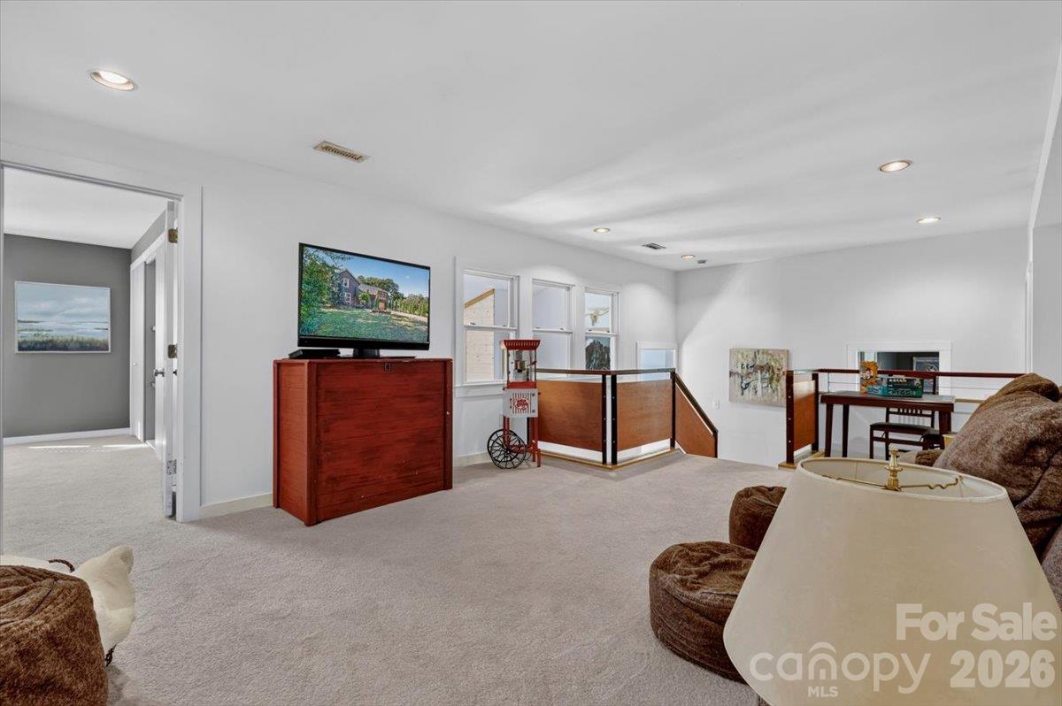 The spacious loft area features what were once windows to the outdoors. - 521 Forest Lane, Rock Hill