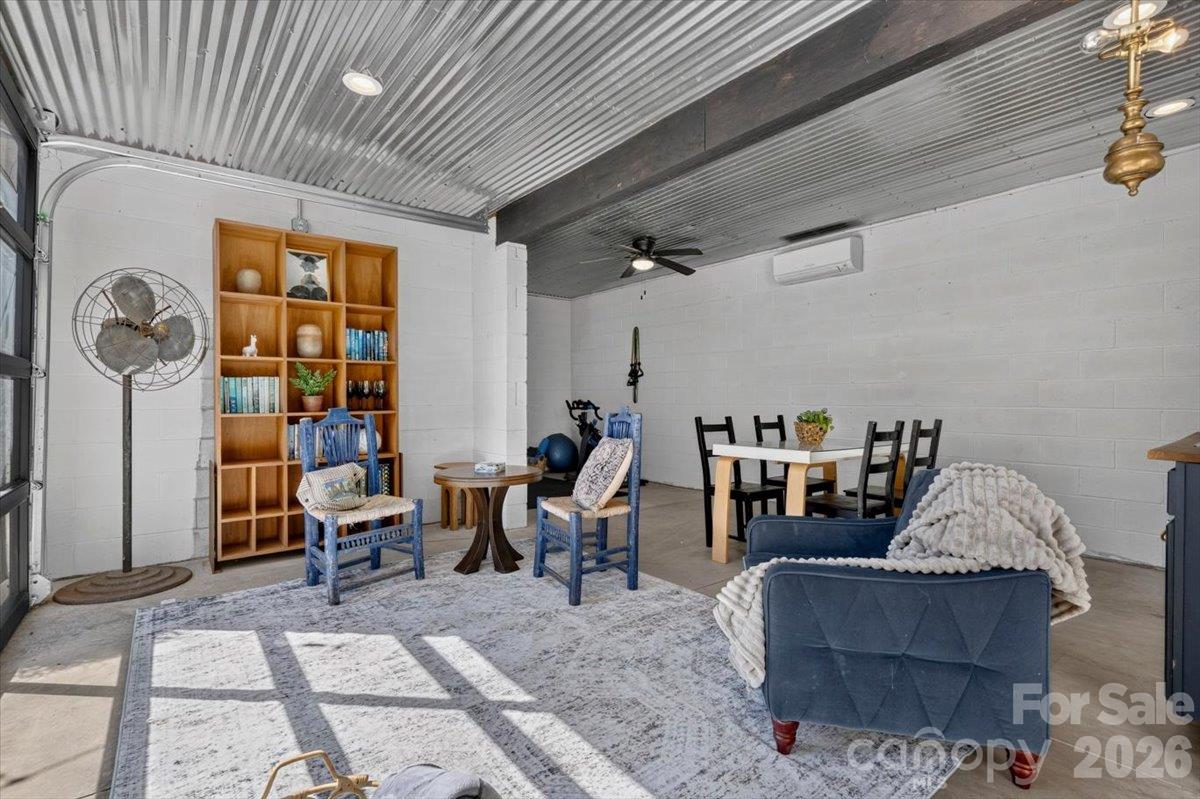 Imagine opening the roll-up door and enjoying the outside while inside. - 521 Forest Lane, Rock Hill