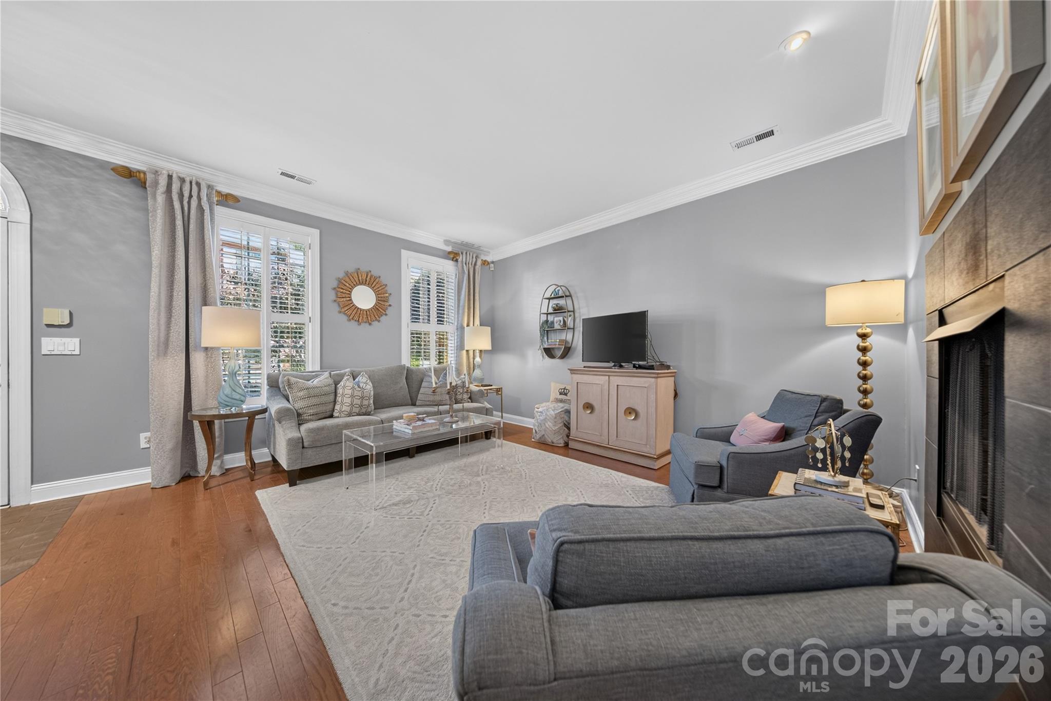 Gorgeous millwork through Living Room and Dining Room - 9251 Bonnie Briar Circle, Charlotte