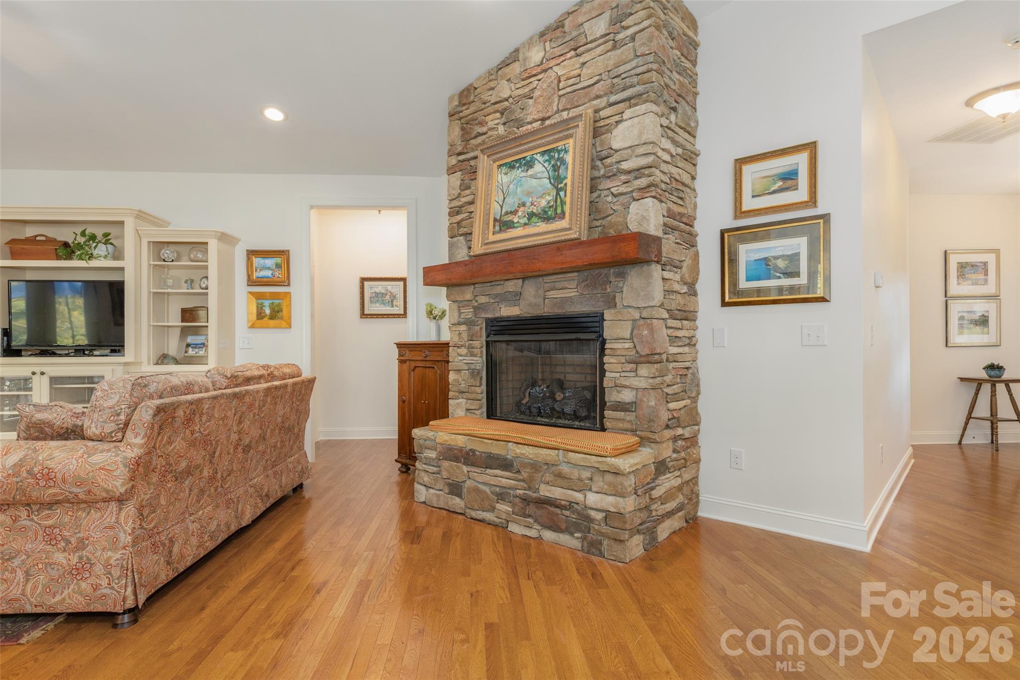 Beautiful stone surround gas fireplace. - 52 Fox Trot Path, Fletcher