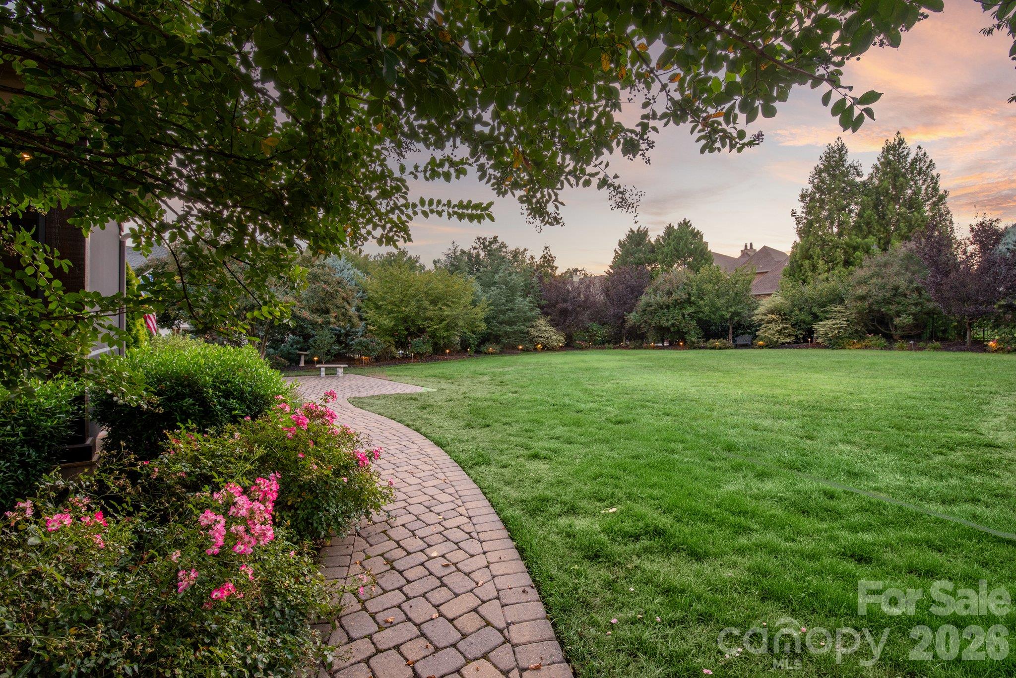 Walkway coming from driveway to backyard - 7805 Clovervale Drive, Waxhaw