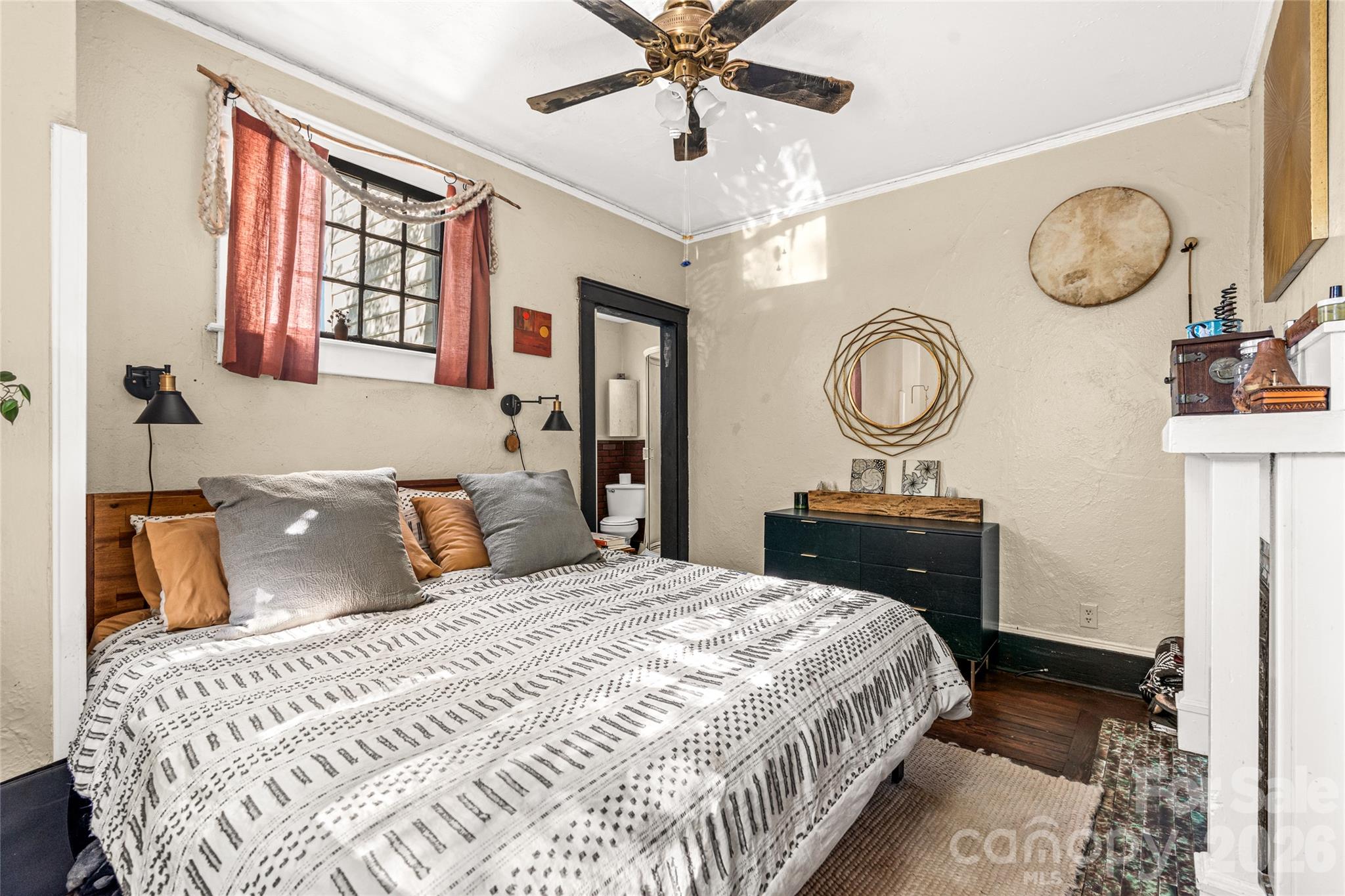 Main level primary bedroom with full bath. Lots of natural lighting. - 77 Cherry Street, Asheville