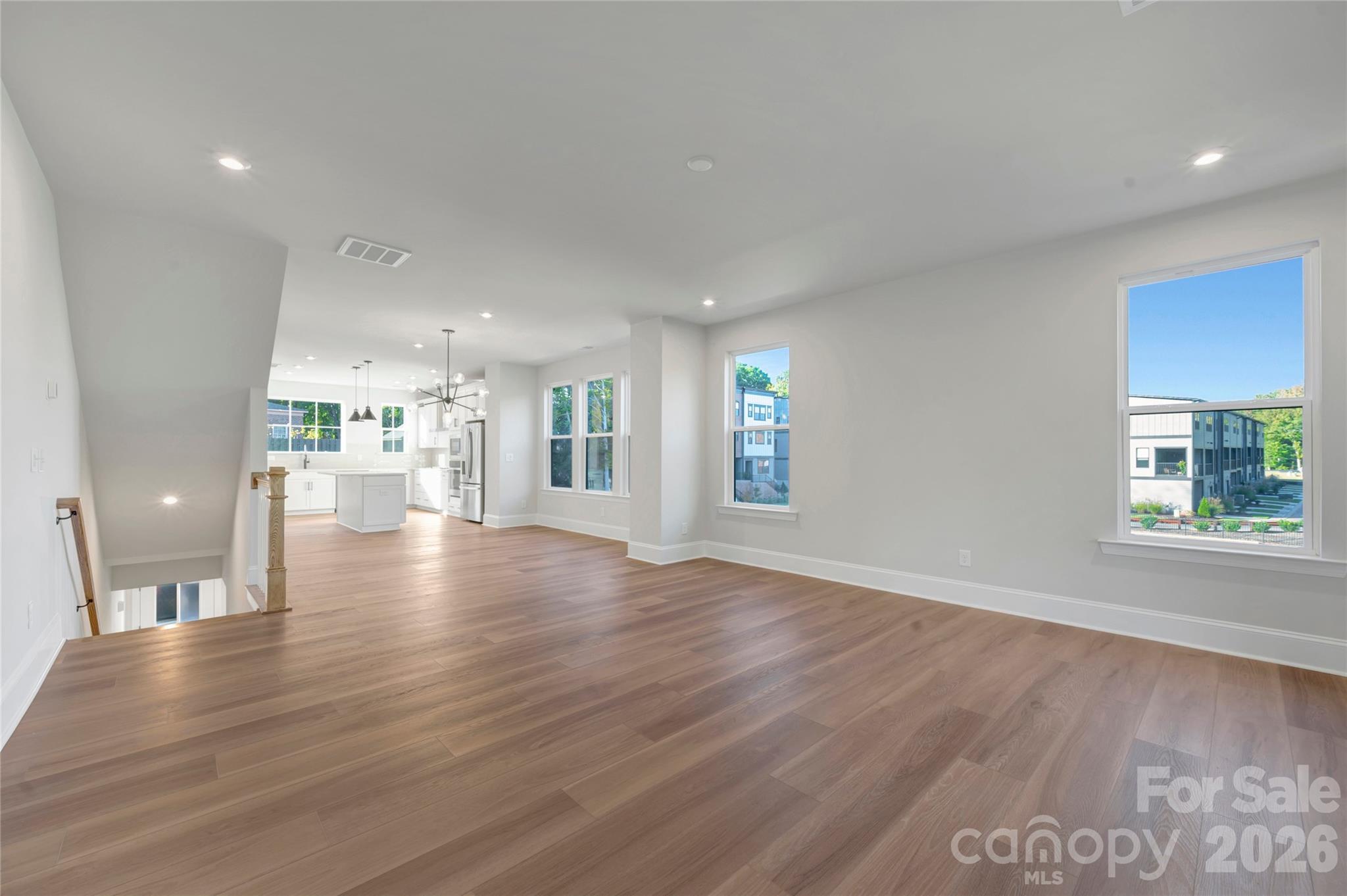 Great room with end unit windows - 240 Old Town Village Road, Waxhaw